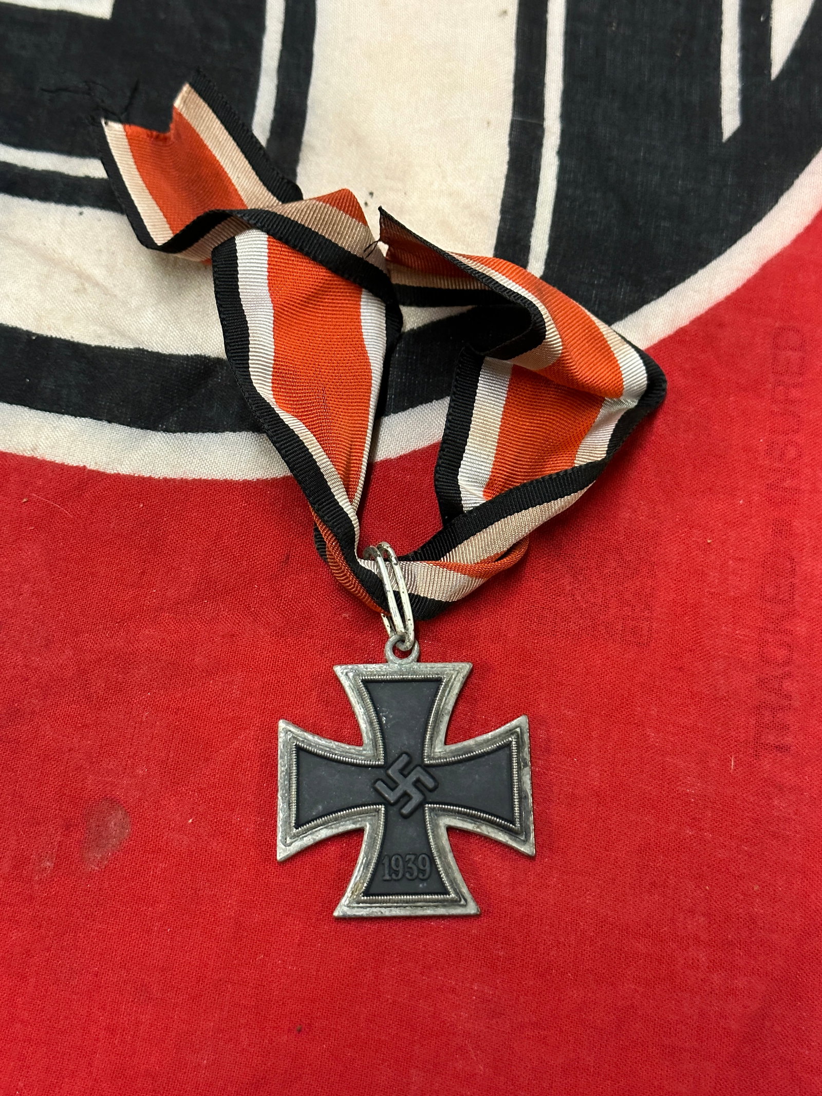 RARE WW2 GERMAN 1939 IRON CROSS SECOND CLASS WITH LONG RIBBON: RARE WW2 GERMAN 1939 IRON CROSS SECOND CLASS WITH LONG RIBBON. A VERY RARE EXAMPLE THAT IS IN MINT OVERALL SHAPE AND CONDITION WITH A BEAUTIFUL OVERALL PATINA. SHOWS GOOD WEAR AND USE. PLEASE VIEW ALL