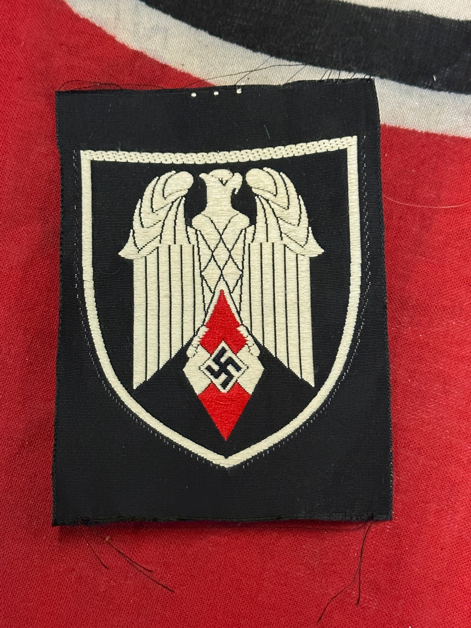 WW2 German Hitler Youth Standard Bearer’s Patch: WW2 German Hitler Youth Standard Bearer’s Patch. Rare Un-issued example that is in mint overall shape and condition with a beautiful overall patina. Please view all detailed pictures. A very rare fi