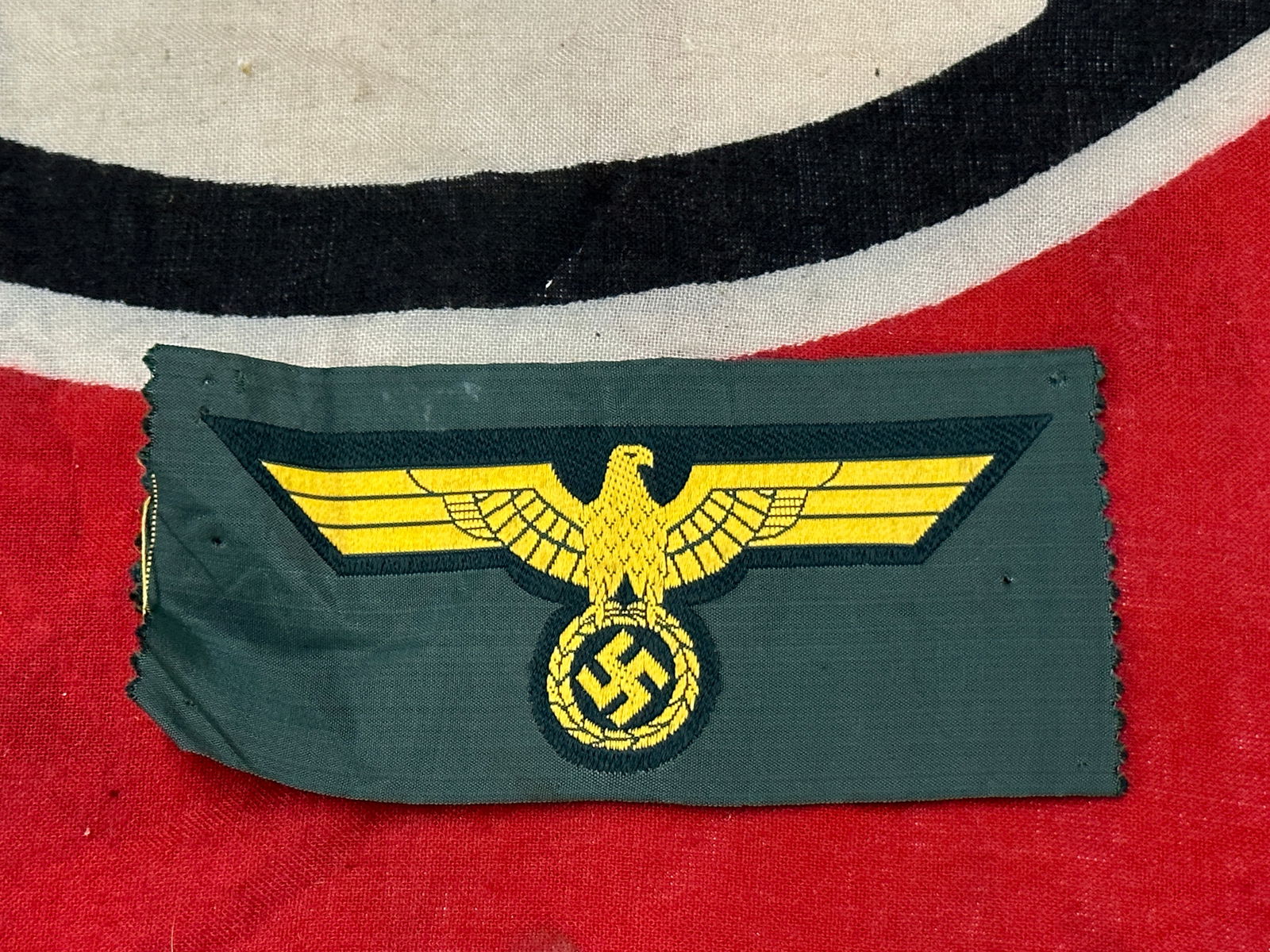 WW2 Germany, Heer. A Coastal Artillery Em/Nco’s Breast Eagle: WW2 Germany, Heer. A Coastal Artillery Em/Nco’s Breast Eagle. (Heer Brustadler). Constructed of field-grey rayon, the obverse bearing a BeVo-style dark green patch overlaid by a golden-yellow Wehrma