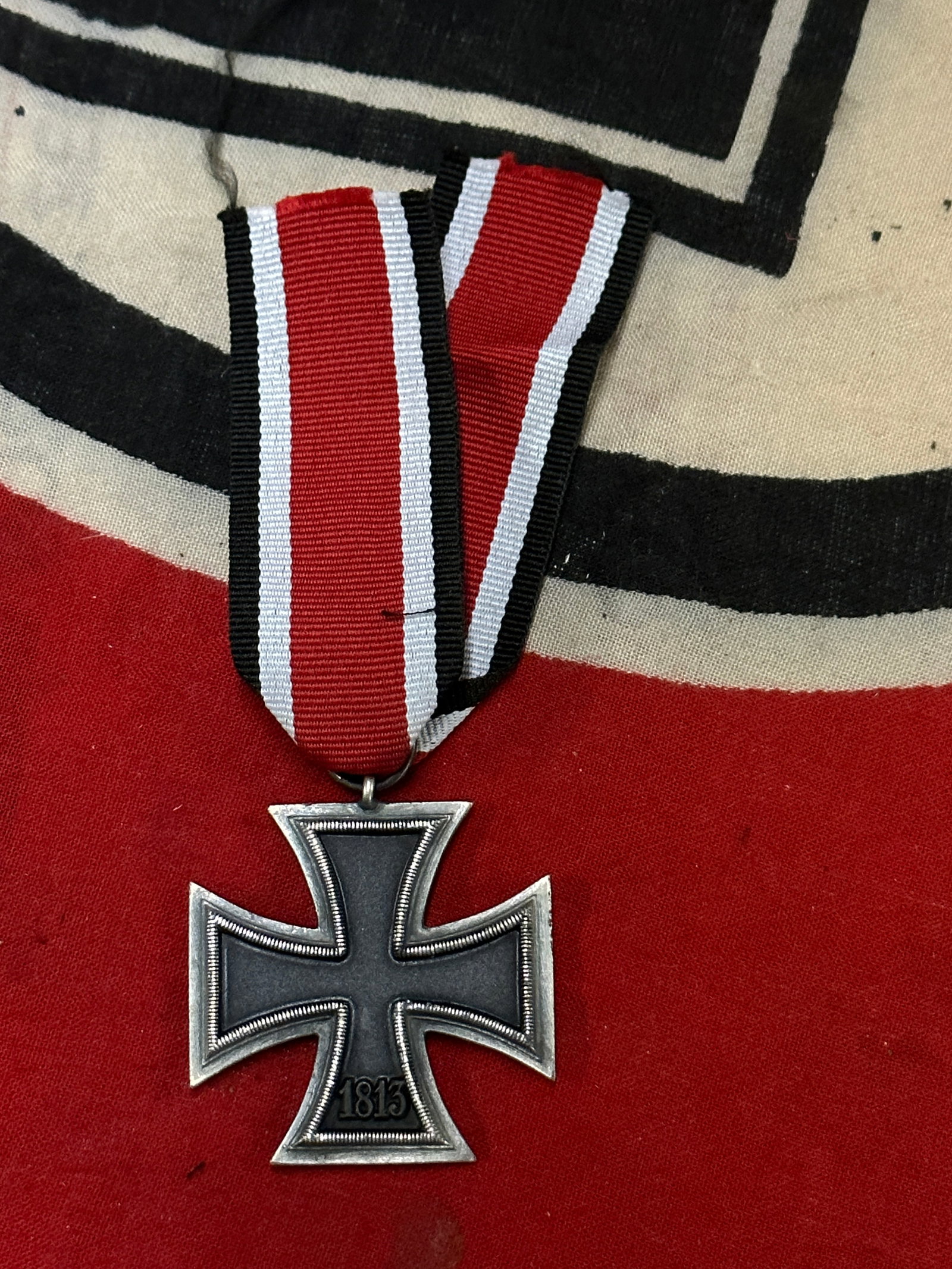 GERMAN IRON CROSS 1813-1939 “2nd CLASS?? WW2 EK2 MEDAL BADGE WITH RIBBON: GERMAN IRON CROSS 1813-1939 “2nd CLASS” WW2 EK2 MEDAL BADGE WITH RIBBON. A SCARCE FIND. SHOWS GOOD WEAR AND USE WITH A BEAUTIFUL OVERALL PATINA. PLEASE VIEW ALL DETAILED PICTURES. A SCARCE FIN