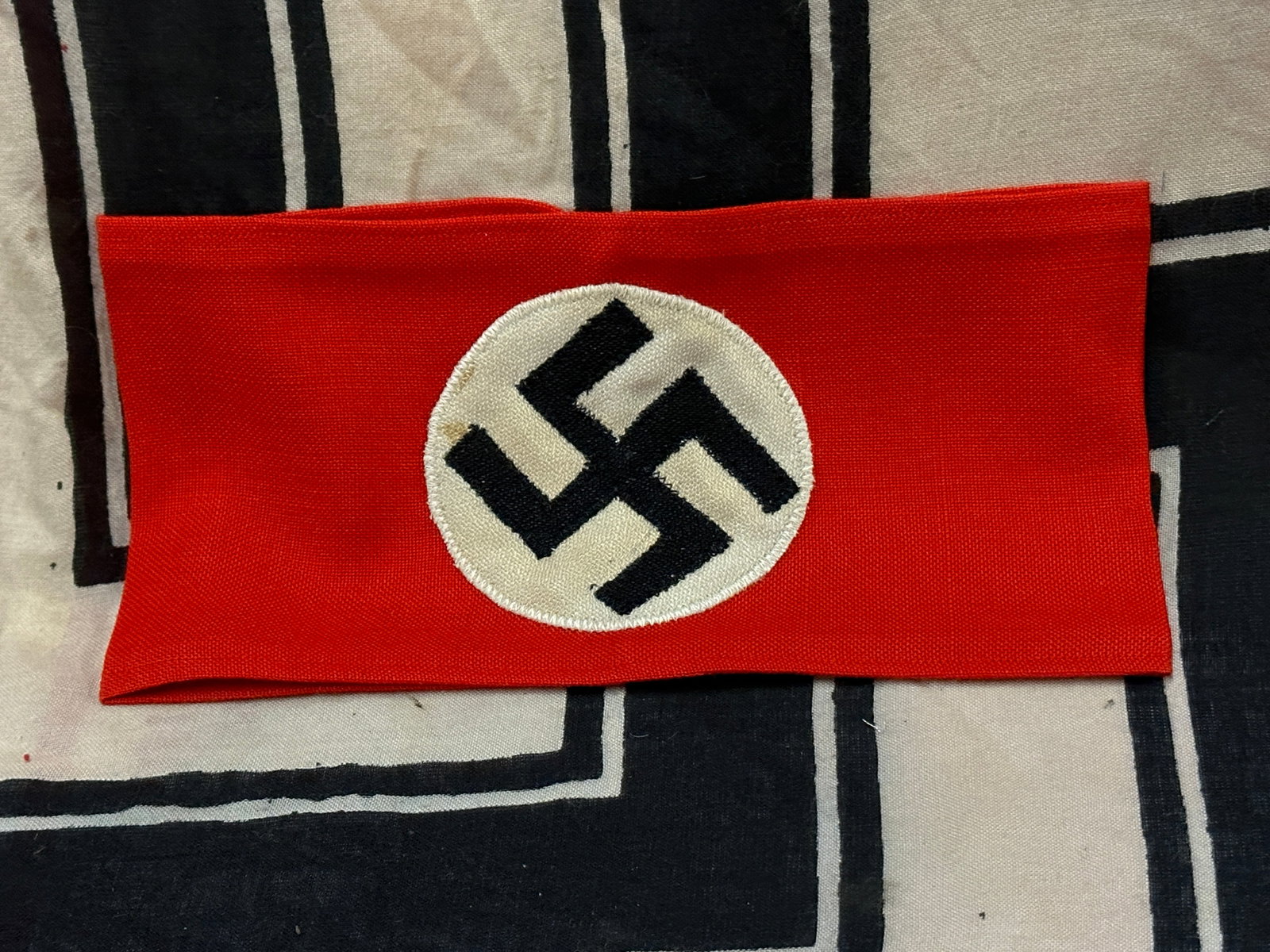 WW2 German NSDAP Armband 3-Piece Construction: WW2 German NSDAP Armband 3-Piece Construction. A rare find that is in mint overall shape and condition with a beautiful overall paitna. Shows good wear and use. Please view all detailed pictures. A sc