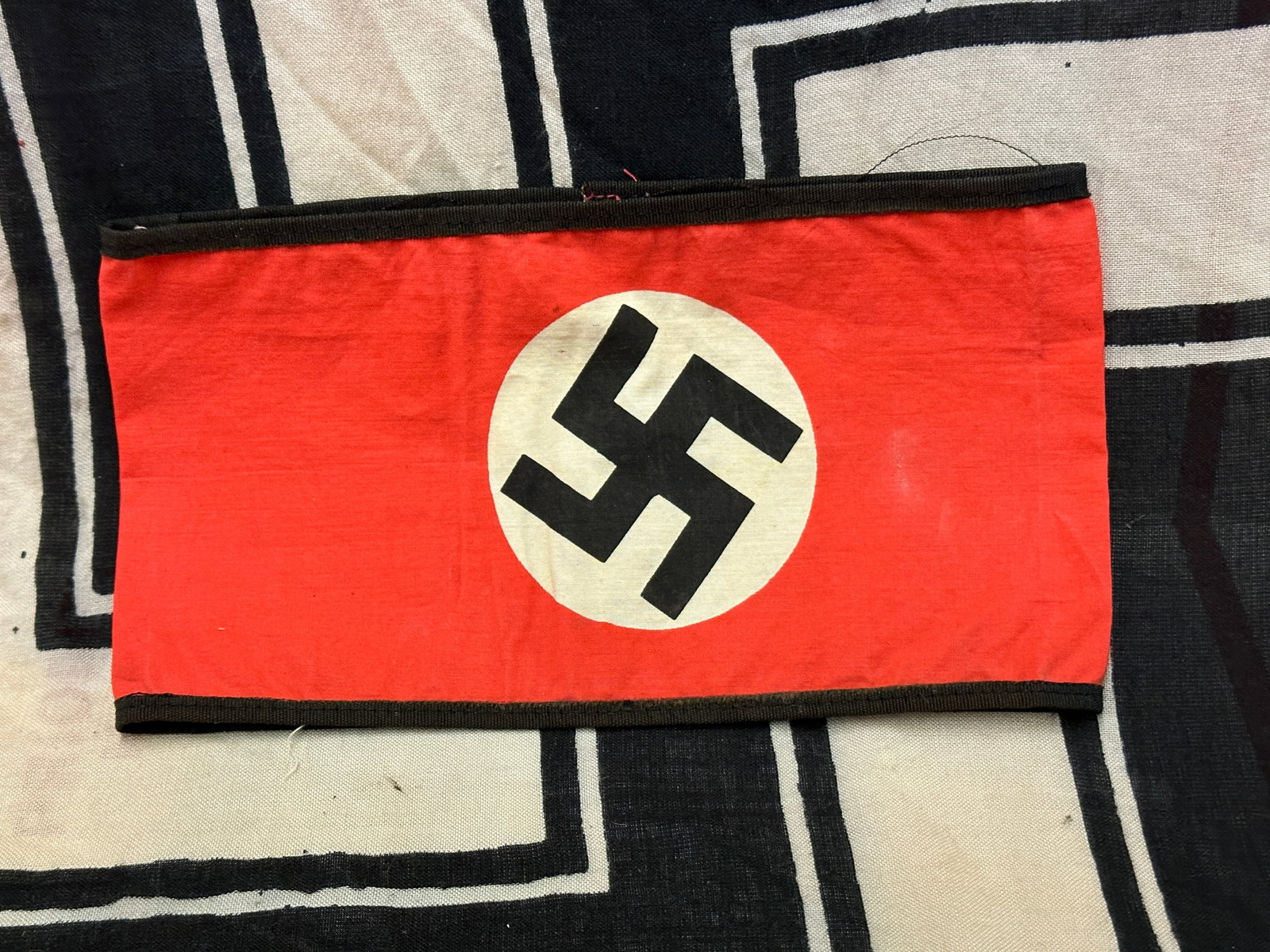 WW2 German Waffen SS Armband Bevo Weave With RZM Stamp: WW2 German Waffen SS Armband Bevo Weave With RZM Stamp. A very rare example. Shows good wear and use with a beautiful overall patina. Please view all detailed pictures. A rare find.