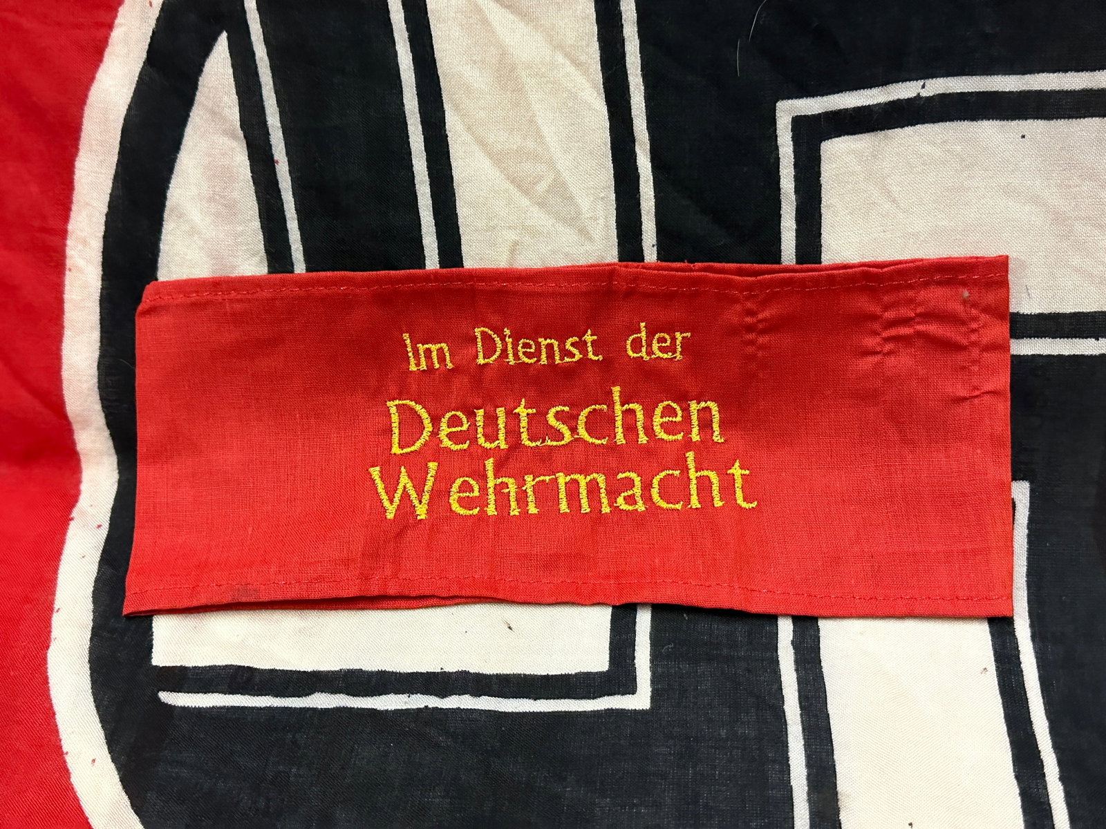 WW2 GERMAN IM DIENST DER DEUTSCHEN WEHRMACHT ARMBAND: WW2 GERMAN IM DIENST DER DEUTSCHEN WEHRMACHT ARMBAND. A RARE EXAMPLE THAT IS IN MINT OVERALL SHAPE AND CONDITION WITH A BEAUTIFUL OVERALL PATINA. PLEASE VIEW ALL DETAILED PICTURES. A SCARCE EXAMPLE.