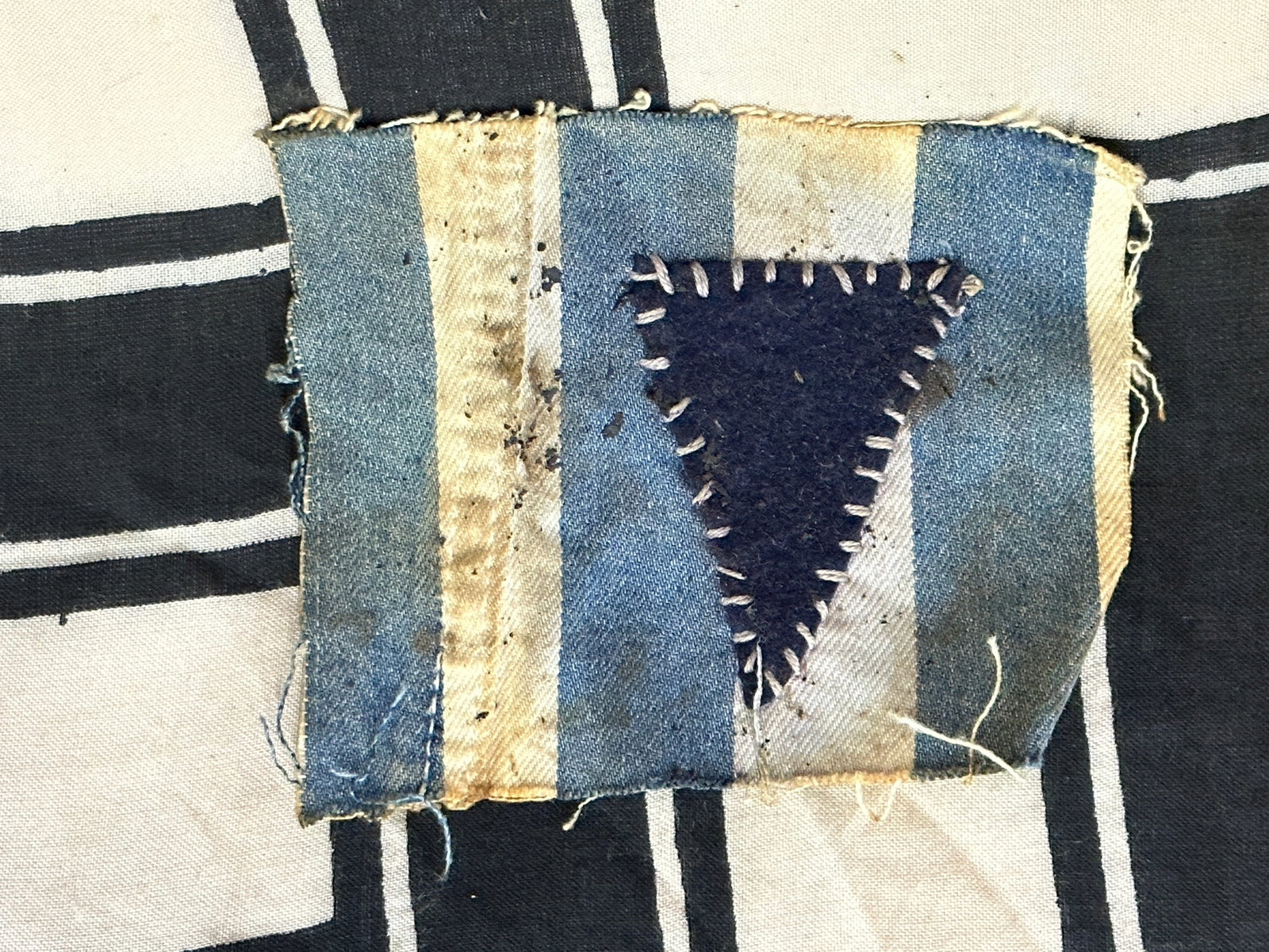WW2 GERMAN CONCENTRATION CAMP JEWISH ARMBAND CUT OUT: WW2 GERMAN CONCENTRATION CAMP JEWISH ARMBAND CUT OUT. AN ULTRA RARE FIND THAT IS IN MINT OVERALL SHAPE AND CONDITION WITH A BEAUTIFUL OVERALL PATINA. PLEASE VIEW ALL DETAILED PICTURES. A SCARCE EXAMPL