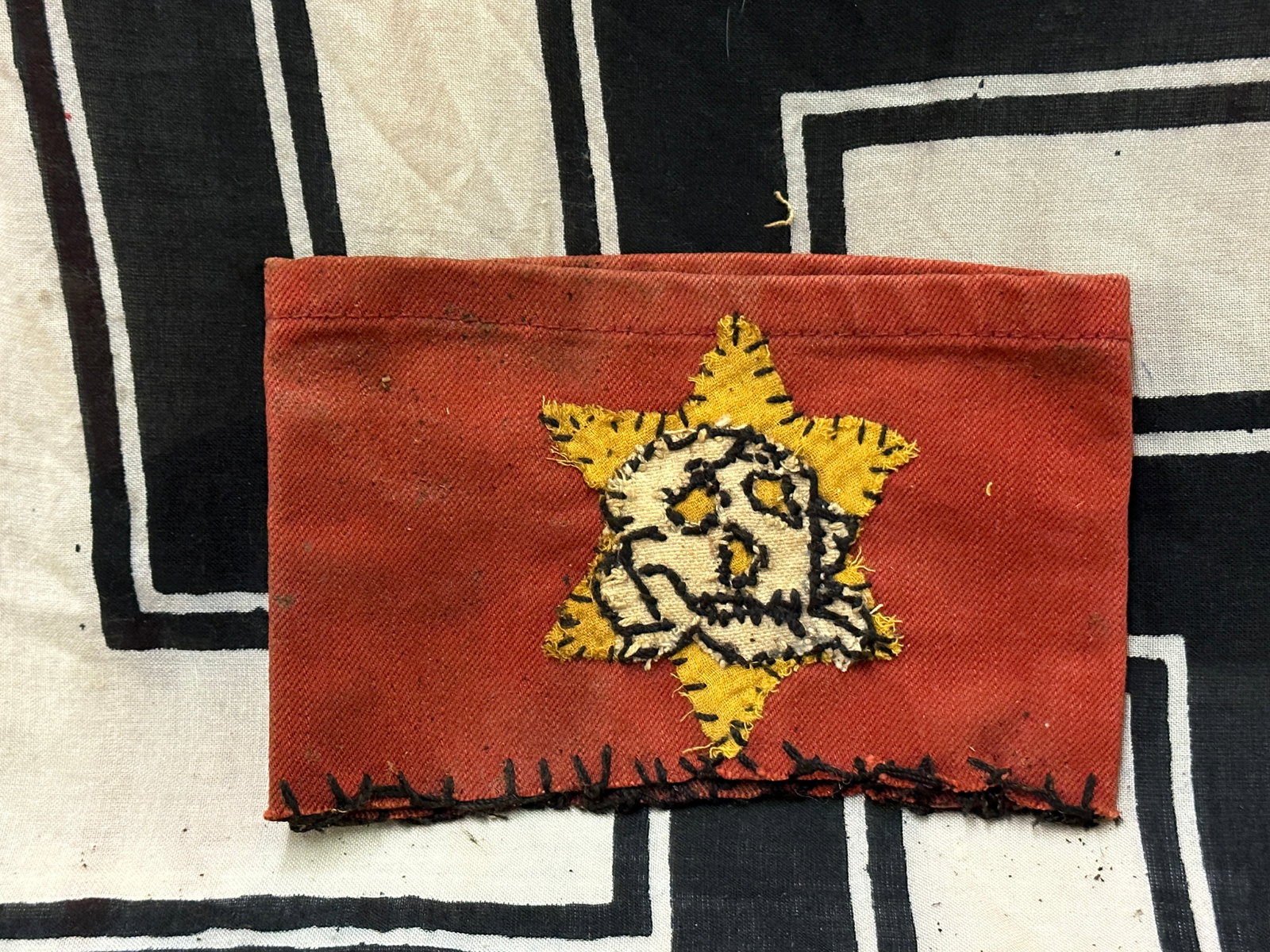 RARE WW2 GERMAN STAR OF DAVID WITH DEATH SKULL ARMBAND: RARE WW2 GERMAN STAR OF DAVID WITH DEATH SKULL ARMBAND. A VERY RARE HARD TO FIND EXAMPLE THAT IS IN MINT OVERALL SHAPE AND CONDITION WITH A BEAUTIFUL OVERALL PATINA. SHOWS GOOD WEAR AND USE. PLEASE VI