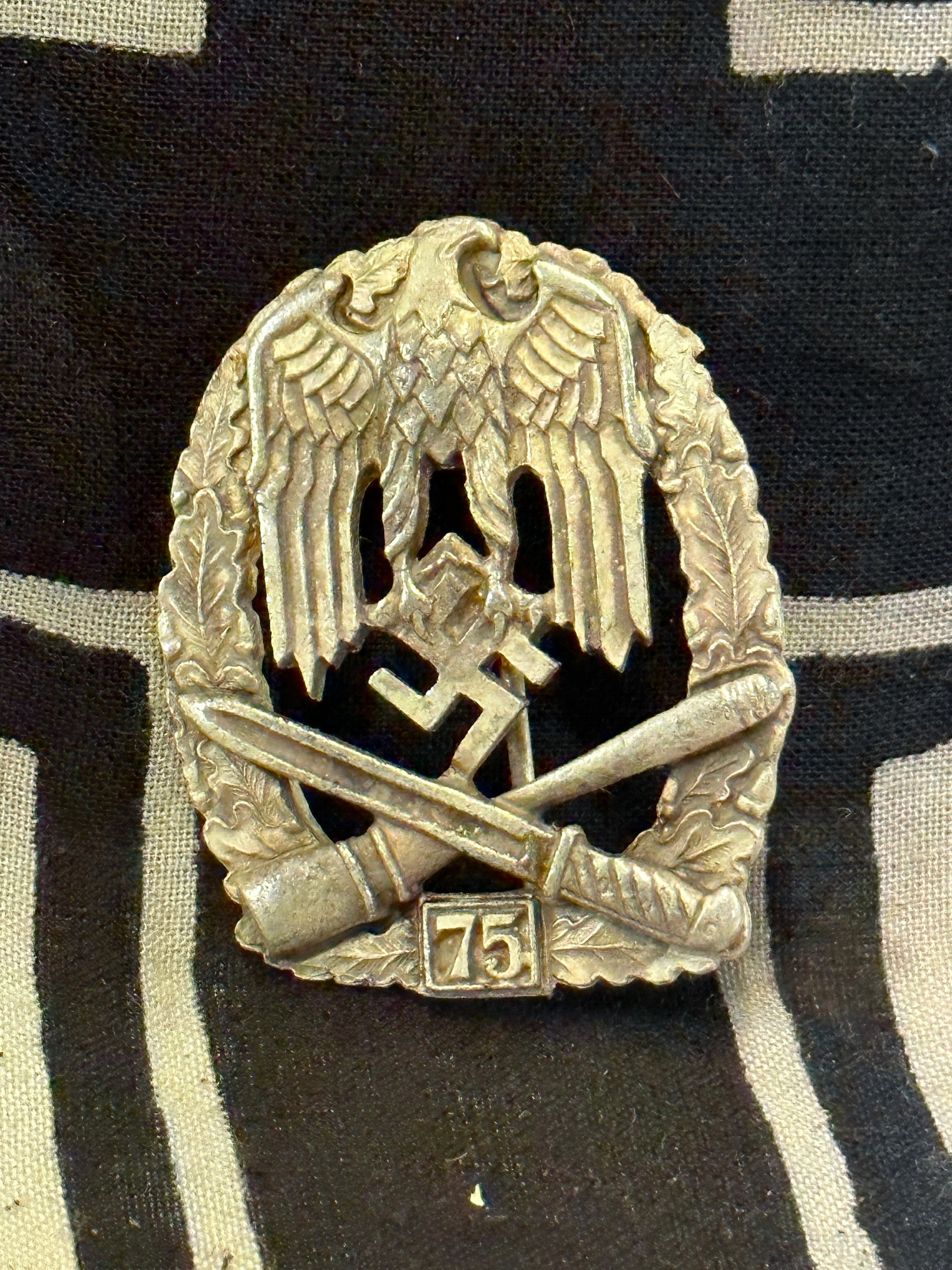 RARE WW2 GERMAN GENERAL ASSAULT BADGE FOR 75 CONSECUTIVE ENGAGEMENTS BY RZM: RARE WW2 GERMAN GENERAL ASSAULT BADGE FOR 75 CONSECUTIVE ENGAGEMENTS BY RZM - MAKER MARKED ON THE REVERSE. A RARE EXAMPLE THAT IS IN MINT OVERALL SHAPE AND CONDITION WITH A BEAUTIFUL OVERALL PATINA. A
