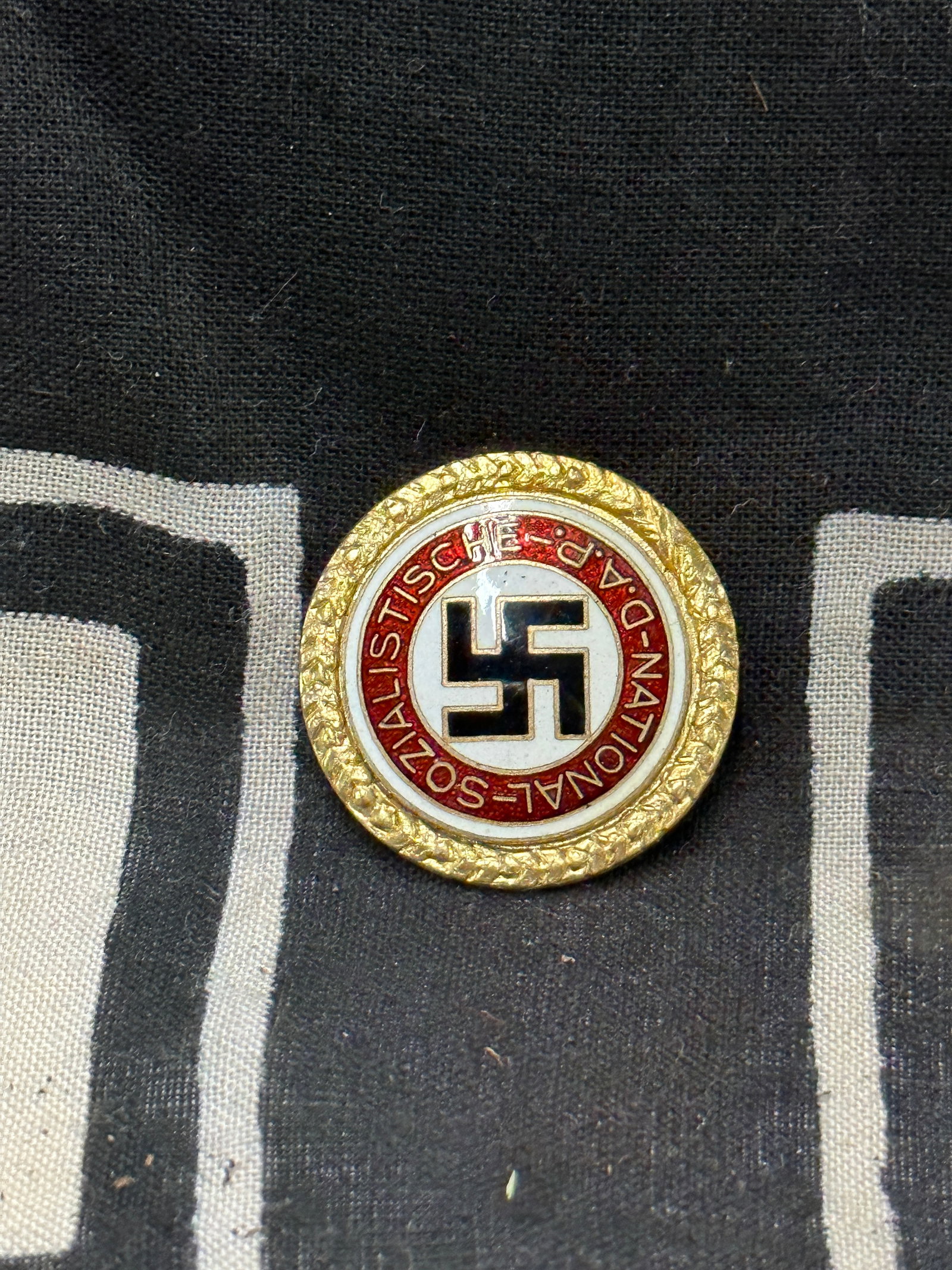 WW2 German NSDAP Large Golden Party Badge With Military Style Pin: WW2 German NSDAP Large Golden Party Badge With Military Style Pin. A RARE EXAMPLE THAT IS IN MINT OVERALL SHAPE AND CONDITION WITH A BEAUTIFUL OVERALL PATINA. APPEARS TO BE WELL WORN. PLEASE VIEW ALL 