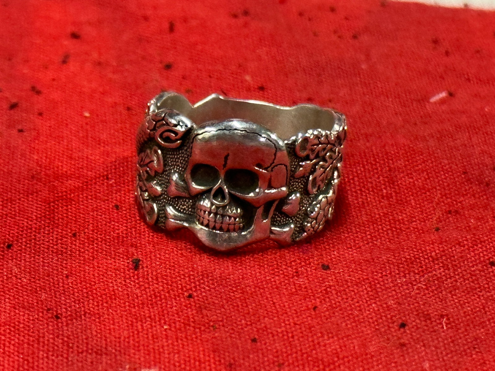 WW2 GERMAN 800 SILVER TOTENKOPF SKULL RING: WW2 GERMAN 800 SILVER TOTENKOPF SKULL RING. A RARE FIND. IT IS IN MINT OVERALL SHAPE AND CONDITION WITH A BEAUTIFUL OVERALL PATINA. SHOWS GOOD WEAR AND USE. PLEASE VIEW ALL DETAILED PICTURES. A SCARCE