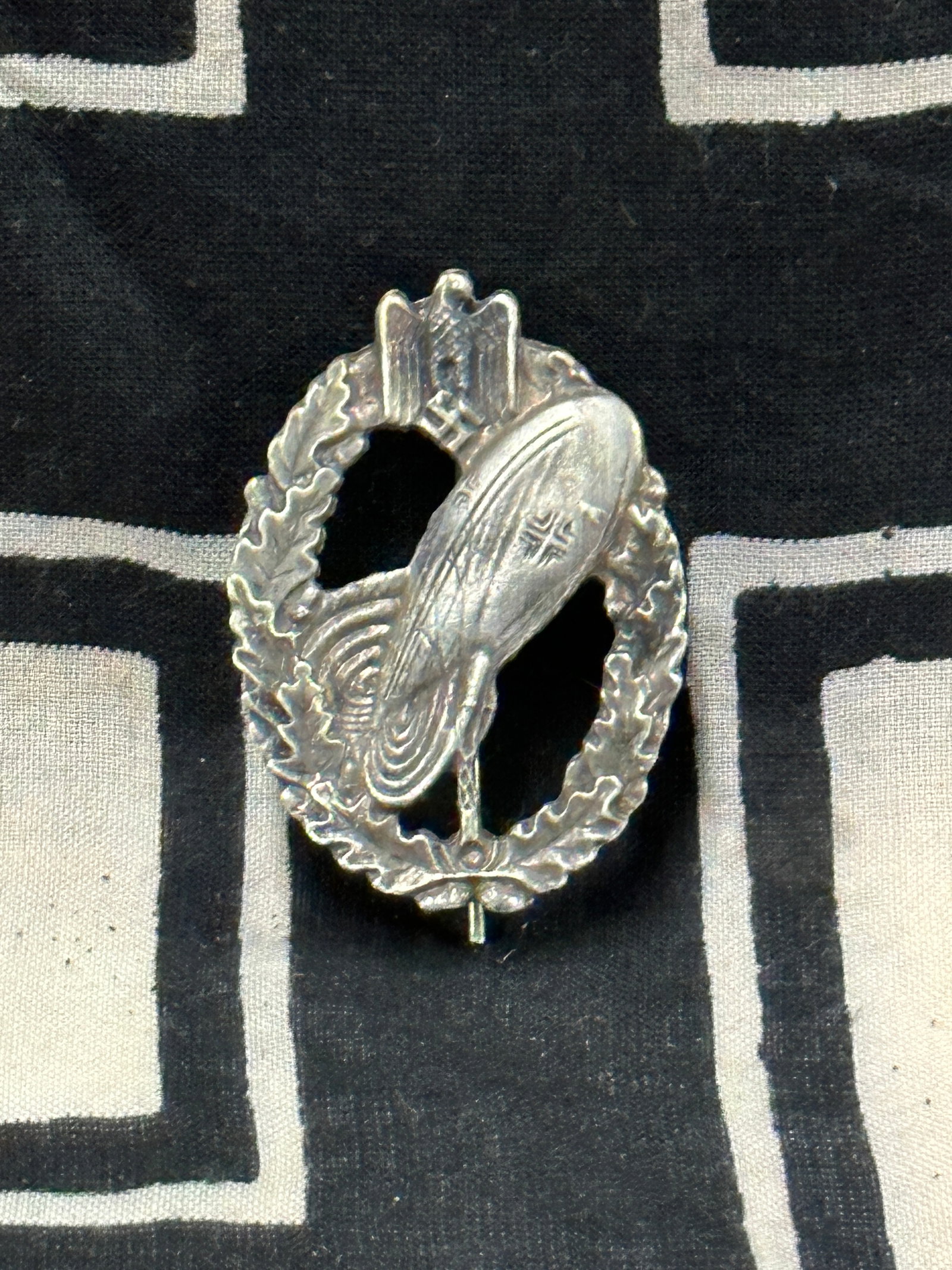 WWII Waffen-SS Balloon Observers badge, silver class By RZM: WWII Waffen-SS Balloon Observers badge, silver class By RZM. A rare example that is in mint overall shape and condition with a beautiful overall patina. Shows good wear and use. Please view all detail