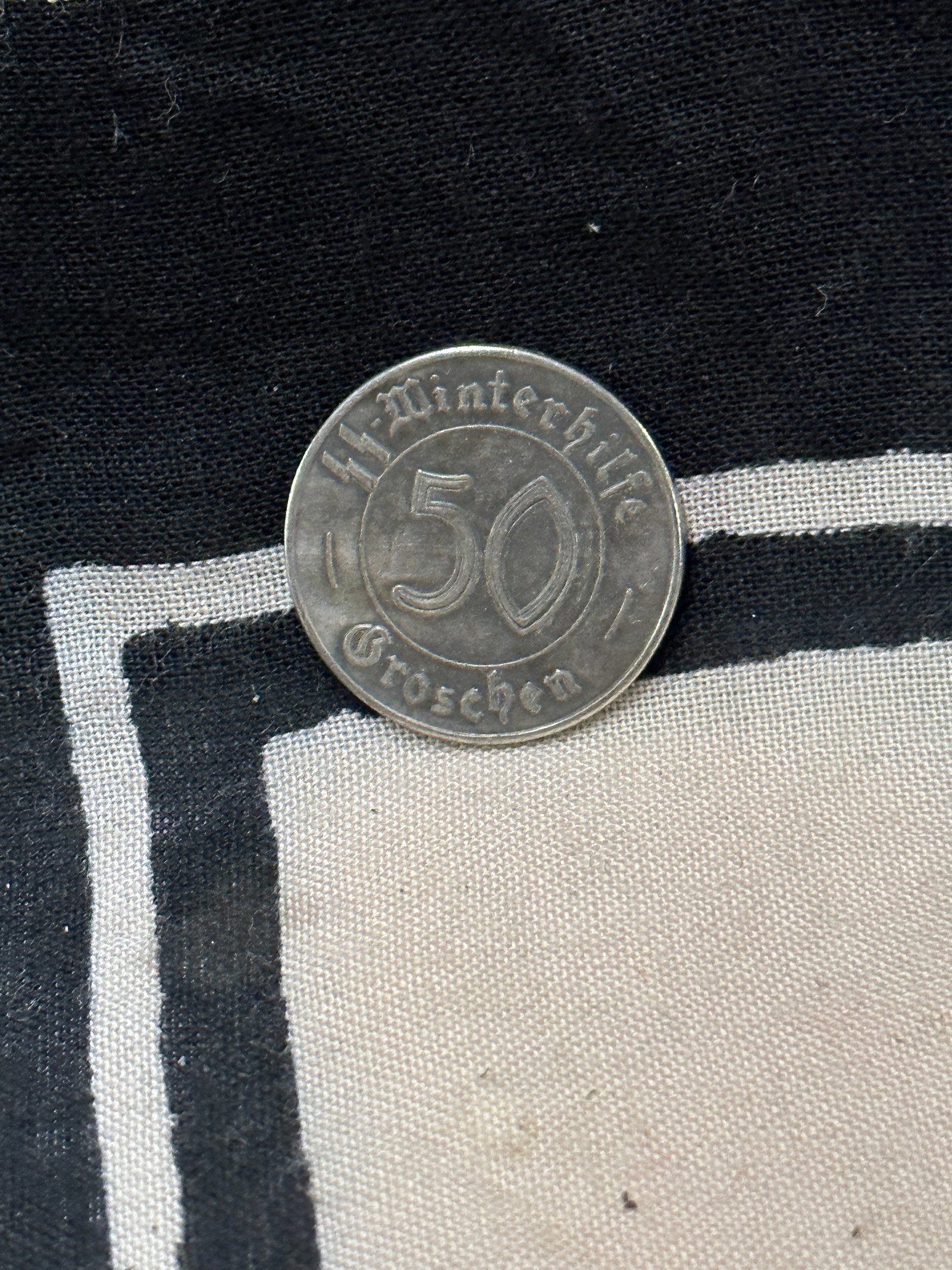 RARE WW2 GERMAN MEINE EHRE HEIBT WAFFEN SS TOKEN COIN: RARE WW2 GERMAN MEINE EHRE HEIBT WAFFEN SS TOKEN COIN. A RARE EXAMPLE THAT IS IN MINT OVERALL SHAPE AND CONDITION WITH A BEAUTIFUL OVERALL PATINA. SHOWS GOOD WEAR AND USE. A VERY SCARCE EXAMPLE.
