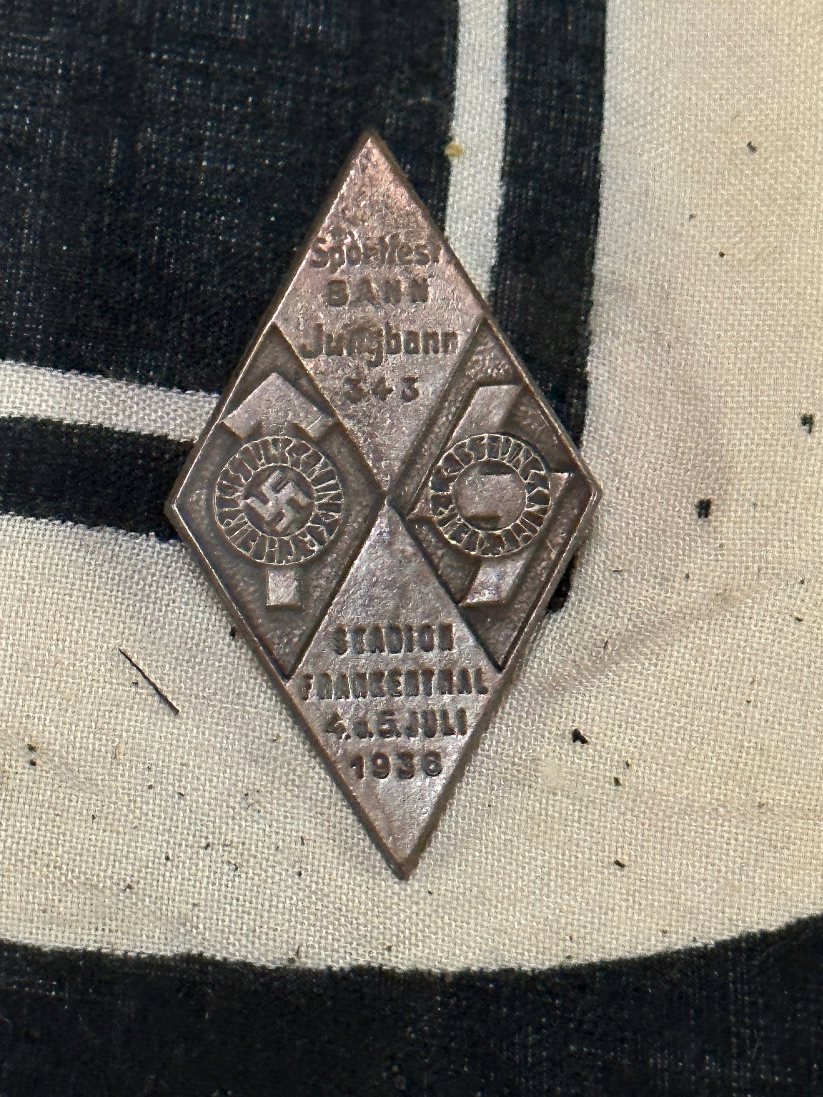SCARCE WW2 GERMAN HITLER YOUTH HJ SPORTS FEST DIAMOND PIN BADGE BY RZM 04/20: SCARCE WW2 GERMAN HITLER YOUTH HJ SPORTS FEST DIAMOND PIN BADGE BY RZM 04/20. A VERY RARE EXAMPLE. IN MINT OVERALL SHAPE AND CONDITION WITH A BEAUTIFUL OVERALL PATINA. SHOWS GOOD WEAR AND USE. A SCARC