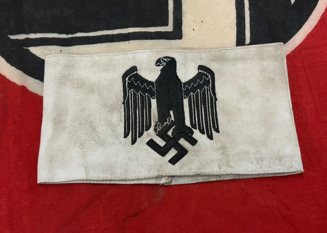 WW2 GERMAN HEER ARMY RECRUITMENT ARMBAND: WW2 GERMAN HEER ARMY RECRUITMENT ARMBAND. An original Heer Recruitment armband, constructed in thin white cotton machine embroidered. The armband features a black thread German Army eagle and swastika