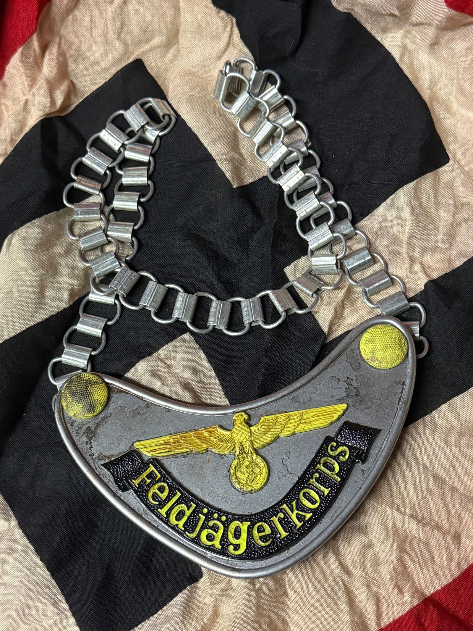 WW2 GERMAN WEHRMACHT FELDGENDARMERIE GORGET: WW2 GERMAN WEHRMACHT FELDGENDARMERIE GORGET. AN ULTRA RARE FIND THAT IS IN MINT OVERALL SHAPE AND CONDITION WITH A BEAUTIFUL OVERALL PATINA. SHOWS GOOD WEAR AND USE. A VERY SCARCE FIND.