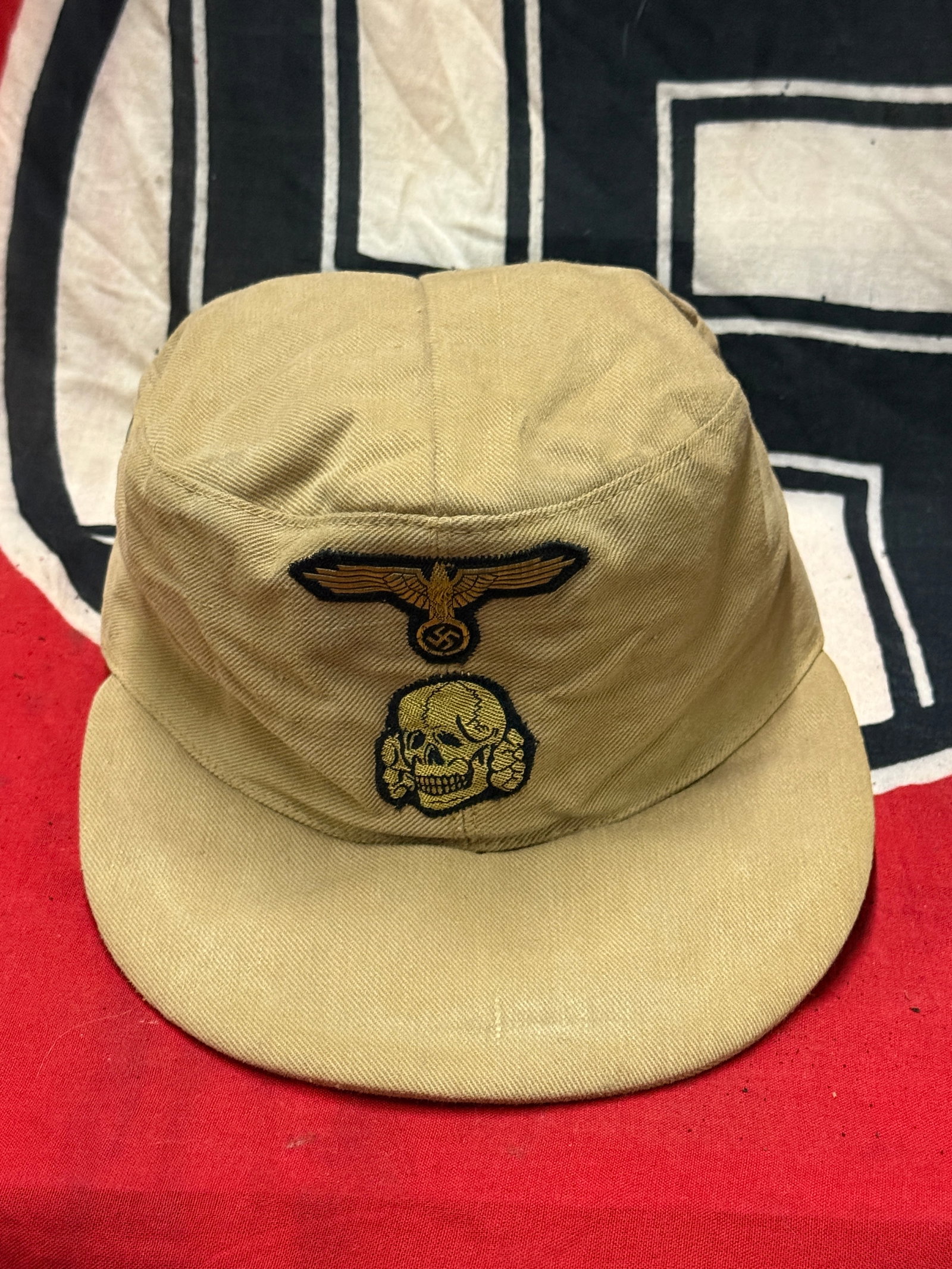AUTHENTIC WW2 GERMAN WAFFEN-SS EM TROPICAL M41 FIELD CAP, COMBAT WORN AND USED: AUTHENTIC WW2 GERMAN WAFFEN-SS EM TROPICAL M41 FIELD CAP, COMBAT WORN AND USED. AN ULTRA RARE AUTHENTIC FIND THAT IS IN MINT OVERALL SHAPE AND CONDITIO WITH A BEAUTIFUL OVERALL PATINA. THIS CAP IS FAC