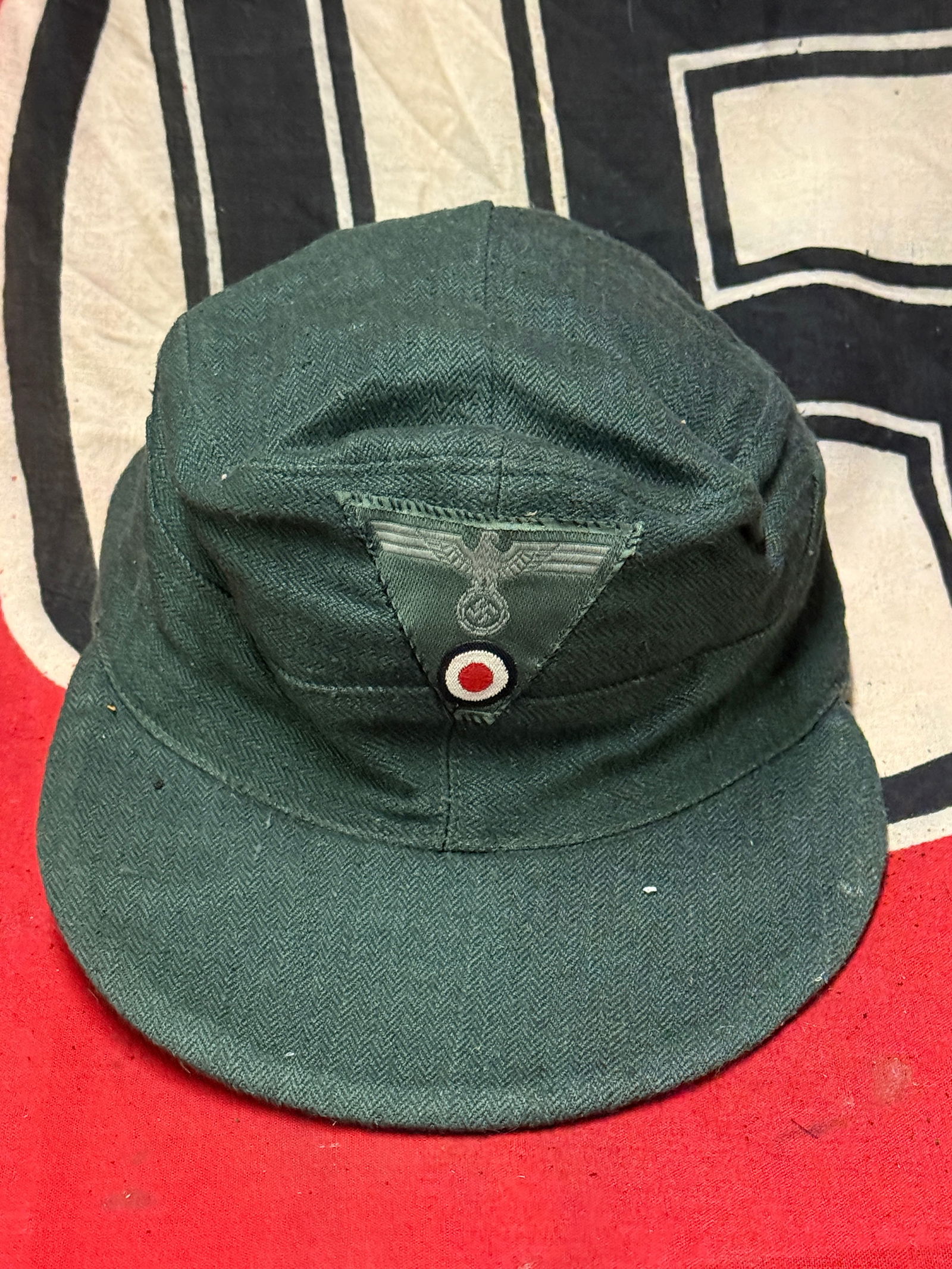 AUTHENTIC WW2 GERMAN WEHRMACHT HEER M43 OFFICER'S FIELD CAP: AUTHENTIC WW2 GERMAN WEHRMACHT HEER M43 OFFICER'S FIELD CAP. THIS IS WAS A VETERAN OWNED AND COLLECTED HAT THAT IS IN MINT OVERALL SHAPE AND CONDITION WITH A BEAUTIFUL OVERALL PATINA. EINHEITSFELDMUTZ