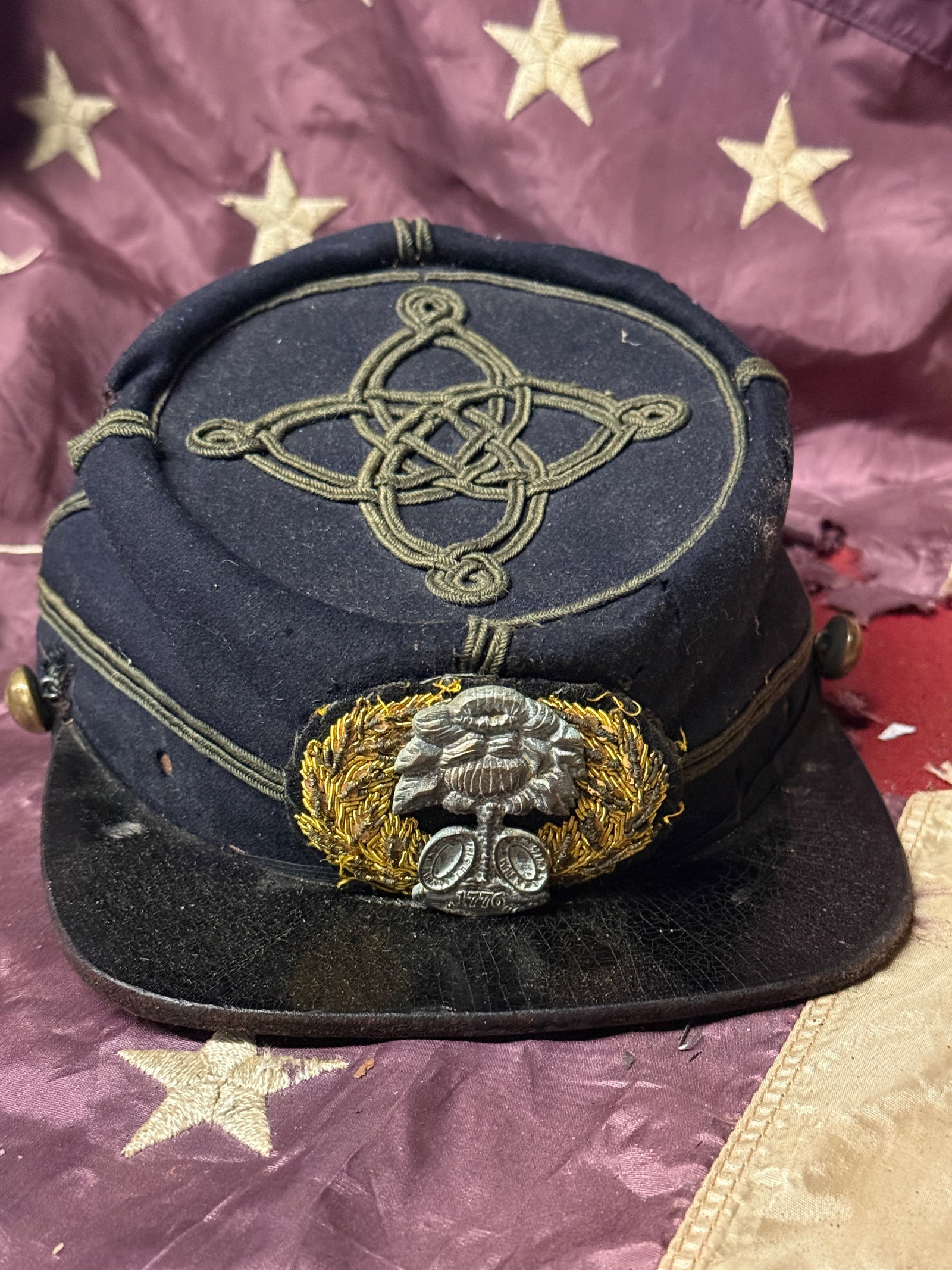 CIVIL WAR CONFEDERATE CSA SOUTH CAROLINE REBEL KEPI HAT CAP: CIVIL WAR CONFEDERATE CSA SOUTH CAROLINE REBEL KEPI HAT CAP. AN ULTRA RARE FIND WITH MATCHING BULLET DOMED BUTONS ON THE SIDES THAT ARE ADRNED WITH A CLOTH CHIN STRAP. BEAUTIFULLY BRAIDED KEPI BELONGI