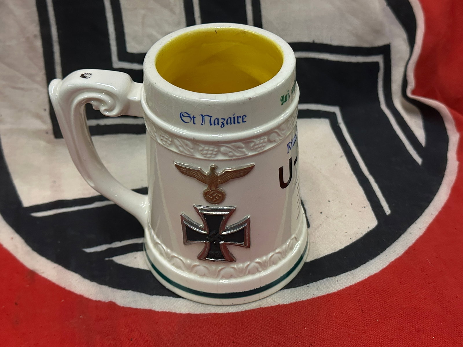 WW2 GERMAN KRIEGSMARINE PORCELAIN STEIN MUG MAKER MARKED RZM HAMBURG #6408: WW2 GERMAN KRIEGSMARINE PORCELAIN STEIN MUG MAKER MARKED RZM HAMBURG #6408. A VERY RARE DECORATIVE PORCELAIN STEIN MUG THAT IS IN MINT OVERALL SHAPE AND CONDITION WITH A BEAUTIFUL OVERALL PATINA. SHOW
