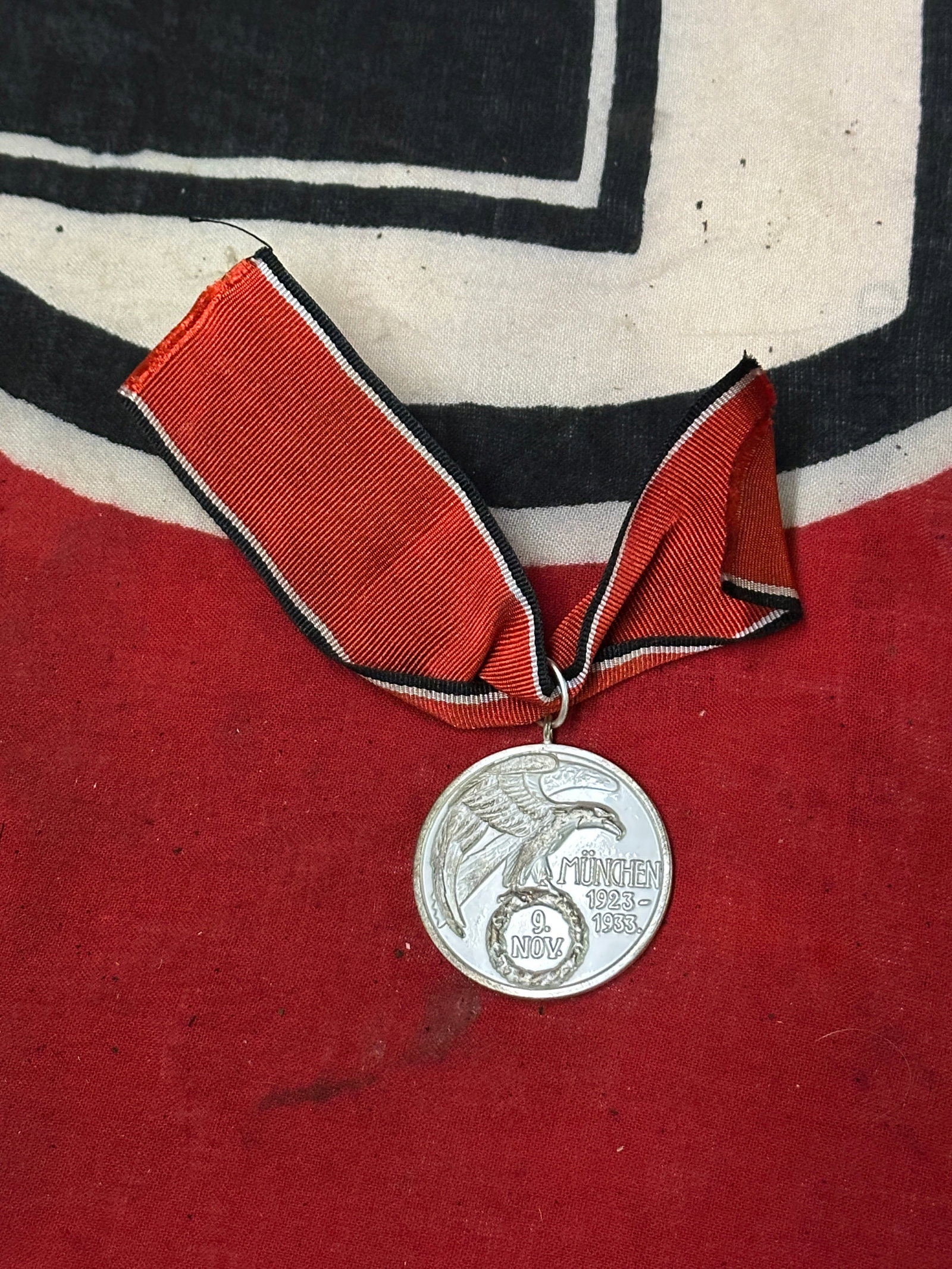 WW2 German NSDAP Blood Order (Blutorden) Medal With Ribbon: WW2 German NSDAP Blood Order (Blutorden) Medal With Ribbon. A rare example that is in mint overall shape and condition with a beautiful overall patina. Please view all detailed pictures. A scarce exam