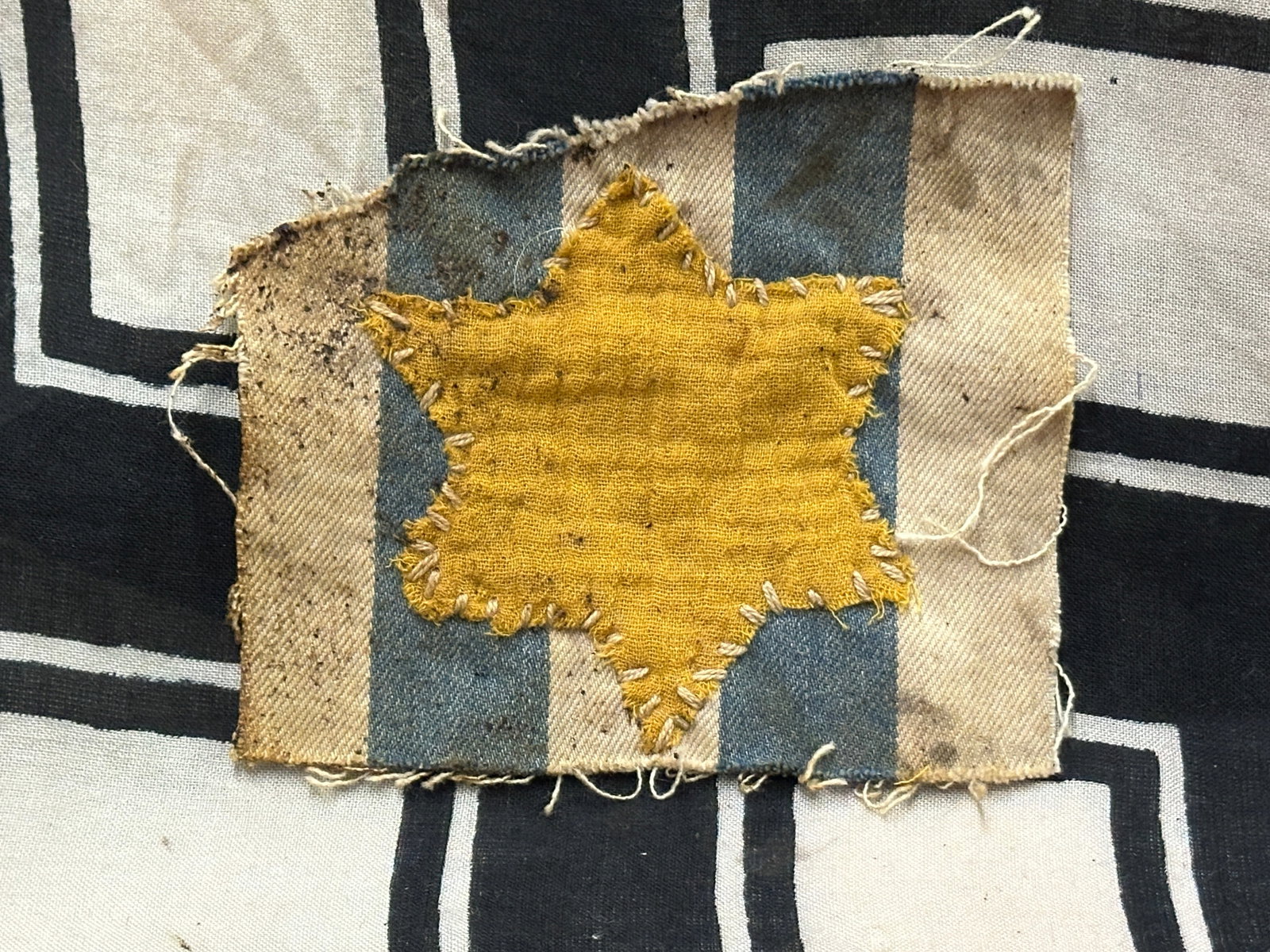 RARE WW2 GERMAN CONCENTRATION CAMP UNIFORM STAR OF DAVID CUT OUT: RARE WW2 GERMAN CONCENTRATION CAMP UNIFORM STAR OF DAVID CUT OUT. A RARE EXAMPLE THAT IS IN MINT OVERALL SHAPE AND CONDITION WITH A BEAUTIFUL OVERALL PATINA. PLEASE VIEW ALL DETAILED PICTURES. A RARE 