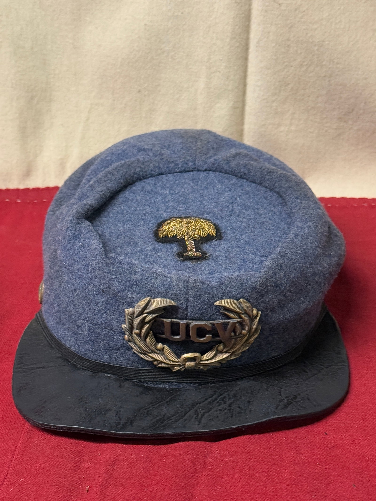 CIVIL WAR CONFEDERATE CSA SOUTH CAROLINA UCV KEPI HAT CAP BY J.A. JOEL & CO.: CIVIL WAR CONFEDERATE CSA SOUTH CAROLINA UCV KEPI HAT CAP BY J.A. JOEL & CO. AN ULTRA RARE CONFEDERATE CSA VETERANS KEPI THAT IS IN MINT OVERALL SHAPE AND CONDITION WITH A BEAUTIFUL OVERALL PATINA. HA