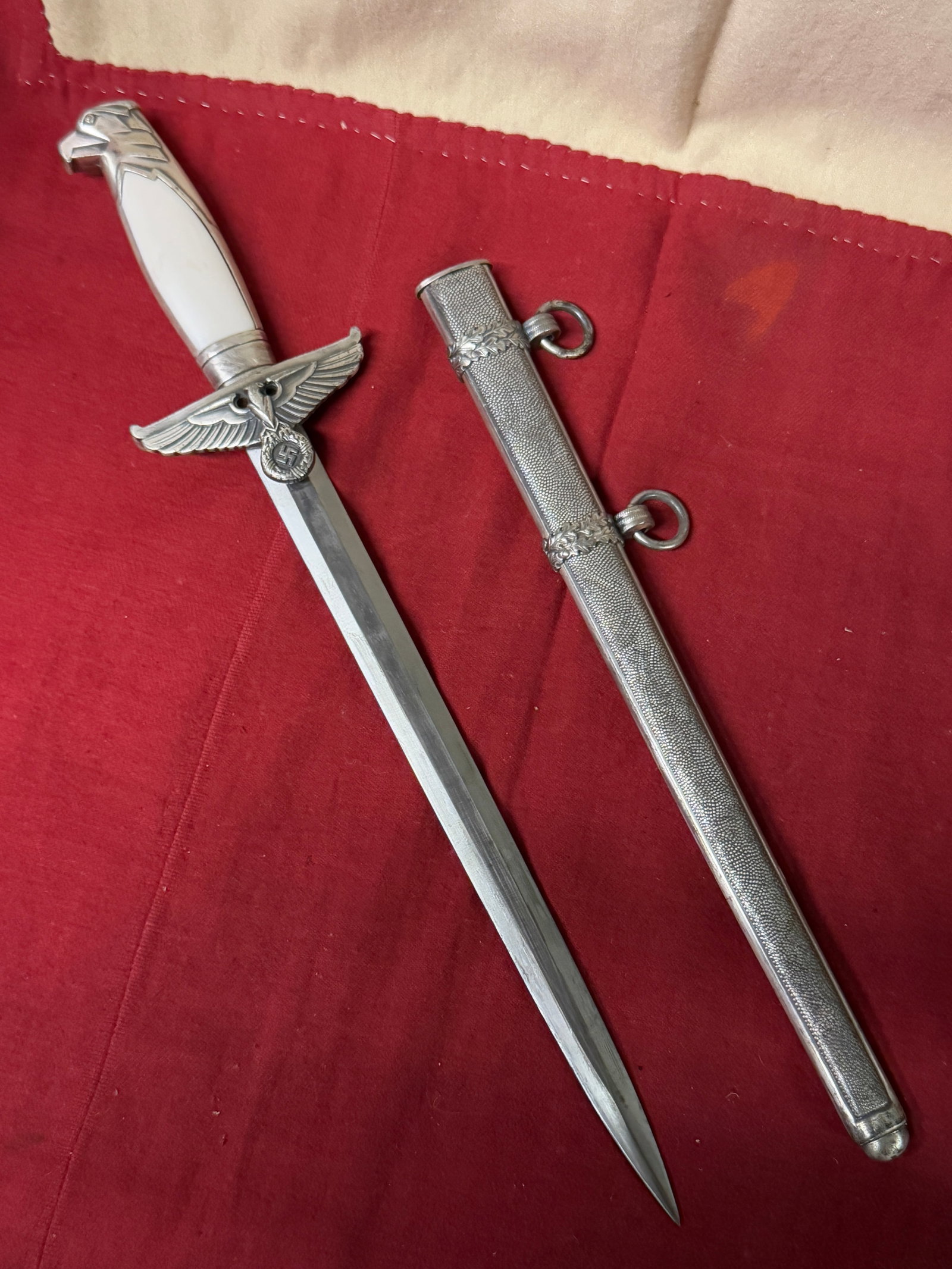 RARE WW2 GERMAN DIPLOMATIC OFFICIAL'S DAGGER BY F.W. HOLLER, BERLIN: RARE WW2 GERMAN DIPLOMATIC OFFICIAL'S DAGGER BY F.W. HOLLER, BERLIN. A VERY RARE DAGGER THAT IS IN MINT OVERALL SHAPE AND CONDITION WITH A BEAUTIFUL OVERALL PATINA. SHOWS GOOD WEAR AND USE. COMES WITH