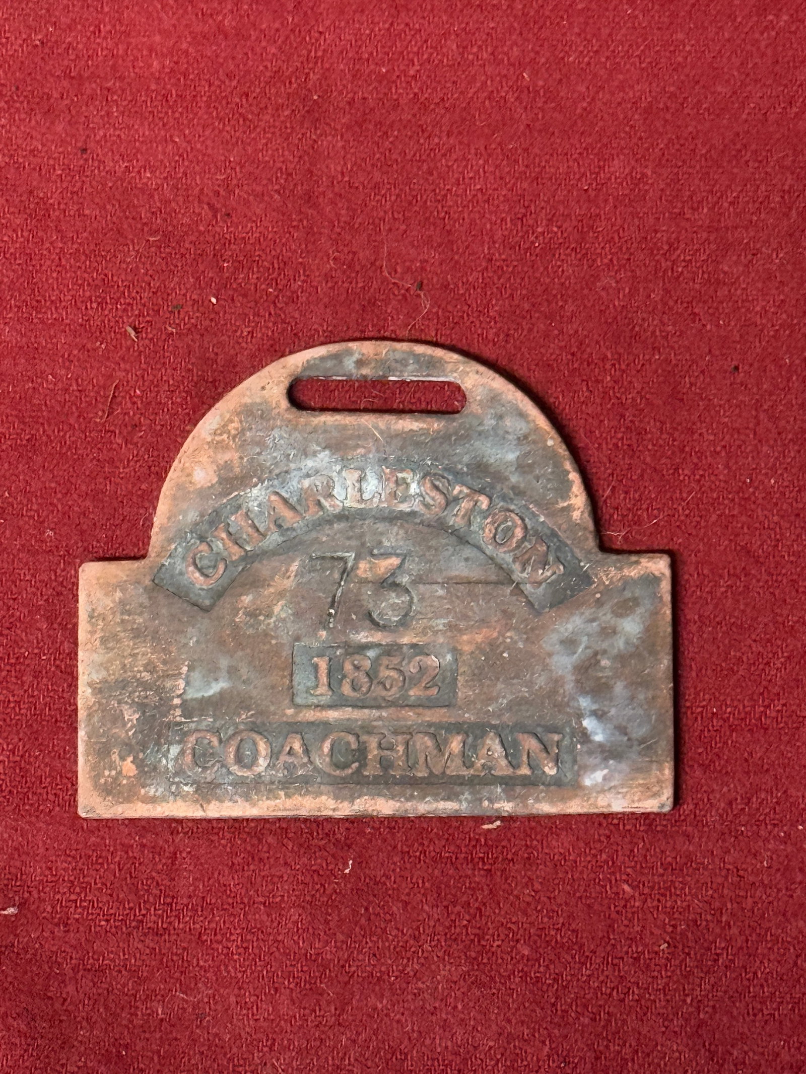 DATED 1852 CHARLESTON #73 COACHMAN SERVANT ID SLAVE TAG: DATED 1852 CHARLESTON #73 COACHMAN SERVANT ID SLAVE TAG. AN ULTRA RARE FIND THAT IS IN MINT OVERALL SHAPE AND CONDITION WITH A BEAUTIFUL OVERALL PATINA. PLEASE VIEW ALL DETAILED PICTURES. A VERY RARE 