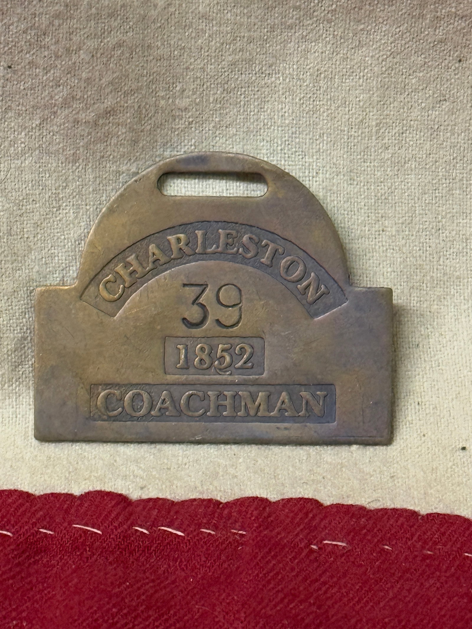 DATED 1852 CHARLESTON COACHMAN SLAVE TAG SERVANT ID: DATED 1852 CHARLESTON COACHMAN SLAVE TAG SERVANT ID. AN ULTRA RARE FIND THAT IS IN MINT OVERALL SHAPE AND CONDITION WITH A BEAUTIFUL OVERALL PATINA. SHOWS GOOD WEAR AND USE. PLEASE VIEW ALL DETAILED P