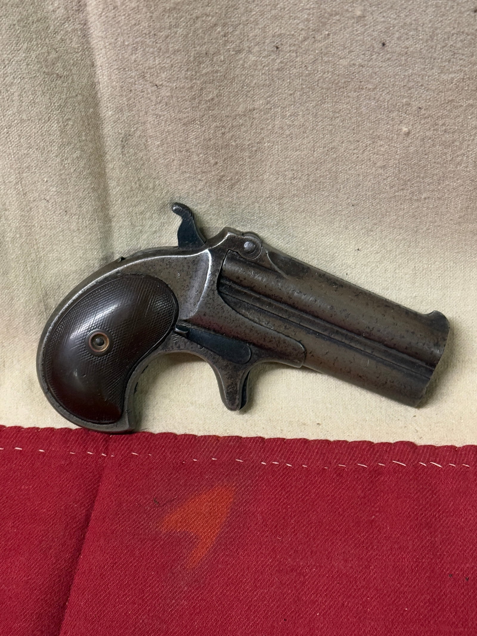 U.S. Remington Model 95 .41 Rimfire Over & Under Pocket Pistol Serial 151 - c. 1889: U.S. Remington Model 95 .41 Rimfire Over & Under Pocket Pistol Serial 151 - c. 1889. A RARE FIND. SHOWS GOOD WEAR AND USE WITH A BEAUTIFUL OVERALL PATINA. THE PISTOL APPEARS TO BE IN GOOD WORKING ORDE