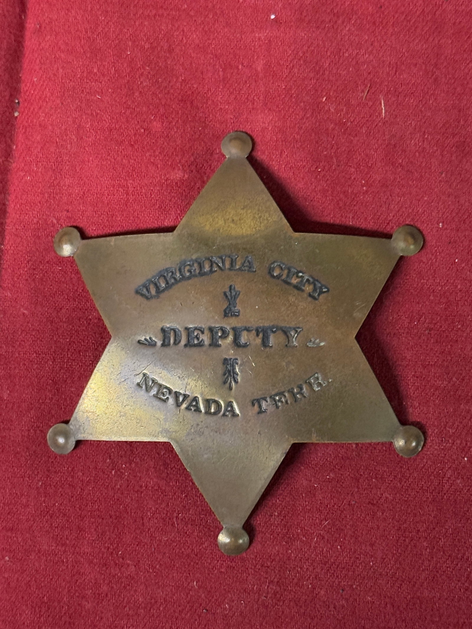 ANTIQUE 1800'S VIRGINIA CITY DEPUTY NEVADA TERR. BADGE: ANTIQUE 1800'S VIRGINIA CITY DEPUTY NEVADA TERR. BADGE. A RARE FIND. IT IS IN MINT OVERALL SHAPE AND CONDITION WITH A BEAUTIFUL OVERALL PATINA. HAS A GREAT LOOK TO IT WITH AN EXCELLENT OVERALL EYE APP