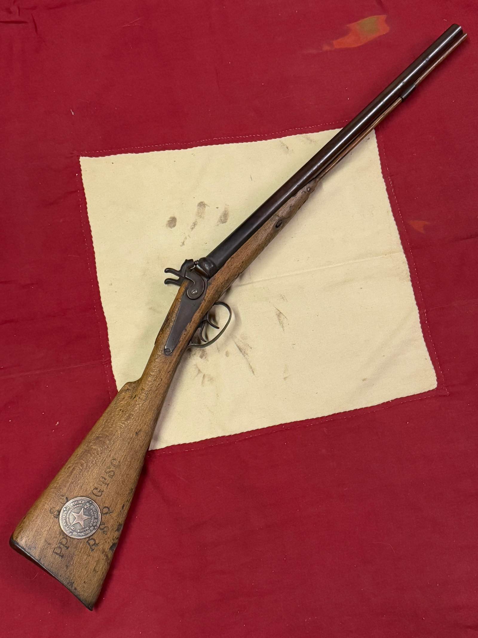 1858 CIVIL WAR PLANTATION POLICE RUNAWAY SLAVE PATROL SGT. SHOTGUN - MAKER MARKED ID'D: 1858 CIVIL WAR PLANTATION POLICE RUNAWAY SLAVE PATROL SGT. RIFLE - MAKER MARKED ID'D. AN ULTRA RARE DOUBLE BARREL SHOTGUN BELONGING TO AND ID'D TO SGT. JAMES BALL. HAS A PLAQUE ON THE BUTT OF THE RIFL