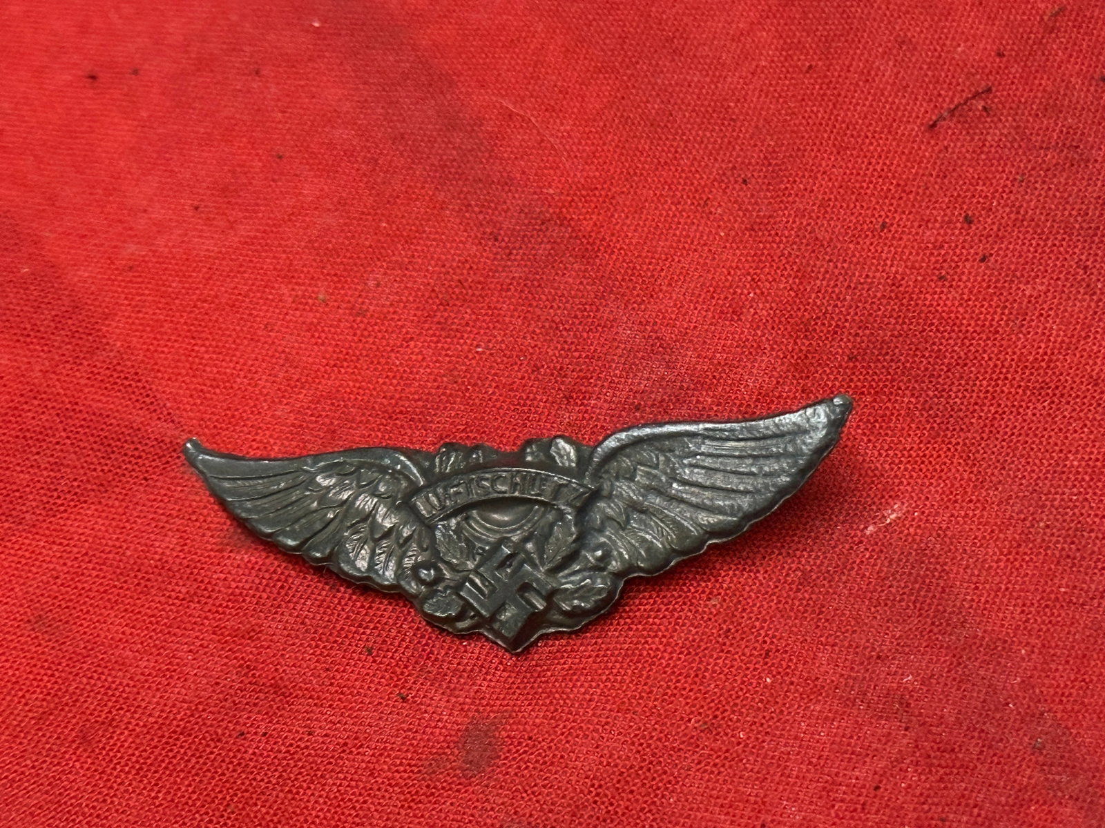 WW2 German Demolished in 1945: The Nuremberg Gate in Erlangen Tinnie Badge: WW2 German Demolished in 1945: The Nuremberg Gate in Erlangen Tinnie Badge. A VERY RARE EXAMPLE THAT IS IN MINT OVERALL SHAPE AND CONDITION WITH A BEAUTIFUL OVERALL PATINA. SHOWS GOOD WEAR AND USE. PL