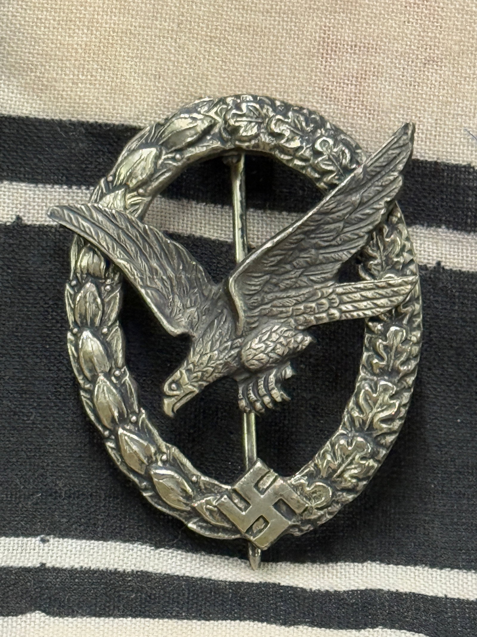 WW2 German Luftwaffe Radio Operator Air Gunner Badge: WW2 German Luftwaffe Radio Operator Air Gunner Badge. A rare example. Shows good wear and use with a beautiful overall patina. Please view all detailed pictures.