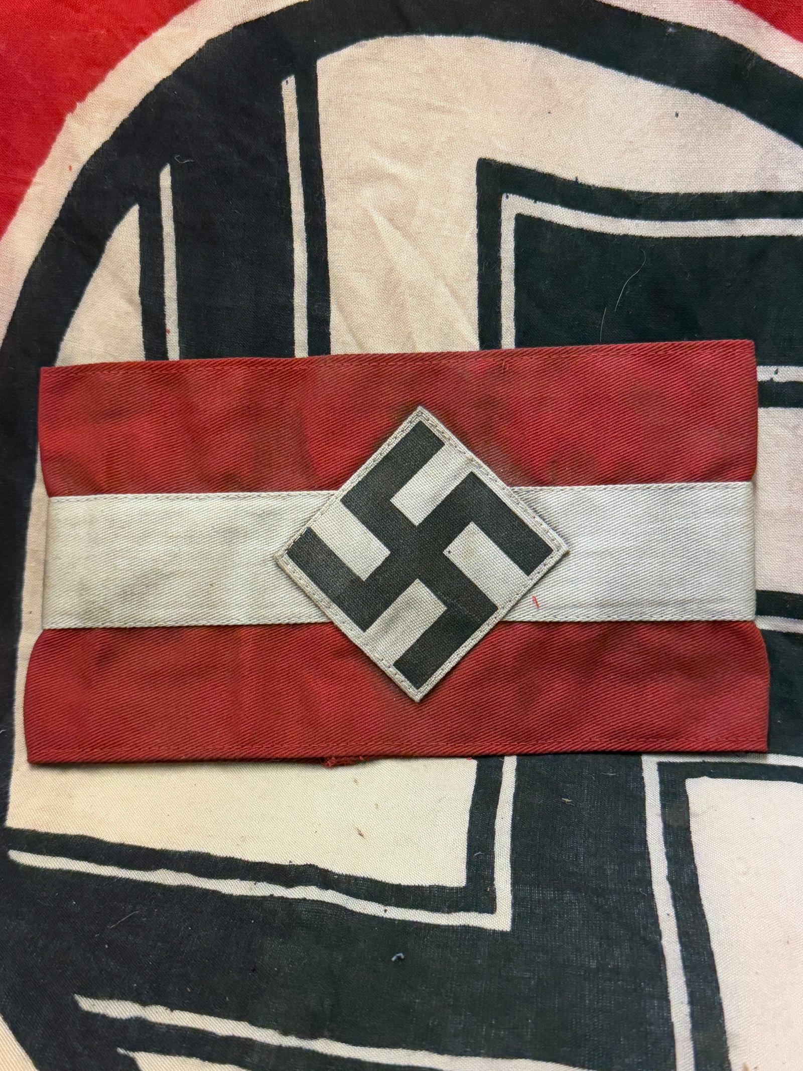 MINT WW2 GERMAN HITLER YOUTH ARMBAND WITH RZM PAPER TAG: MINT WW2 GERMAN HITLER YOUTH ARMBAND WITH RZM PAPER TAG. A VERY RARE EXAMPLE. IT IS IN MINT OVERALL SHAPE AND CONDITION WITH A BEAUTIFUL OVERALL PATINA. SHOWS GOOD WEAR AND USE. PLEASE VIEW ALL DETAIL