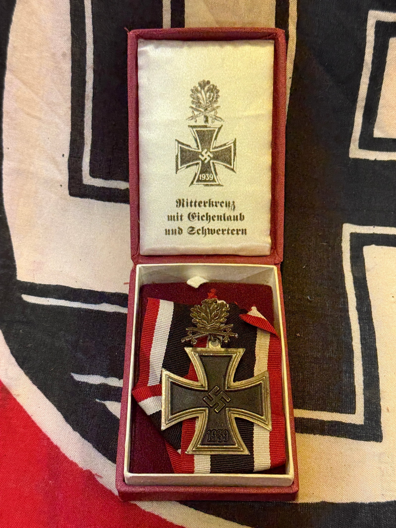 CASED WW2 GERMAN KNIGHTS CROSS OF THE IRON CROSS WITH OAK LEAVES: CASED WW2 GERMAN KNIGHTS CROSS OF THE IRON CROSS WITH OAK LEAVES. AN ULTRA RARE FIND THAT IS IN MINT OVERALL SHAPE AND CONDITION WITH A BEAUTIFUL OVERALL PATINA. SHOWS GOOD WEAR AND USE. COMES IN THE 