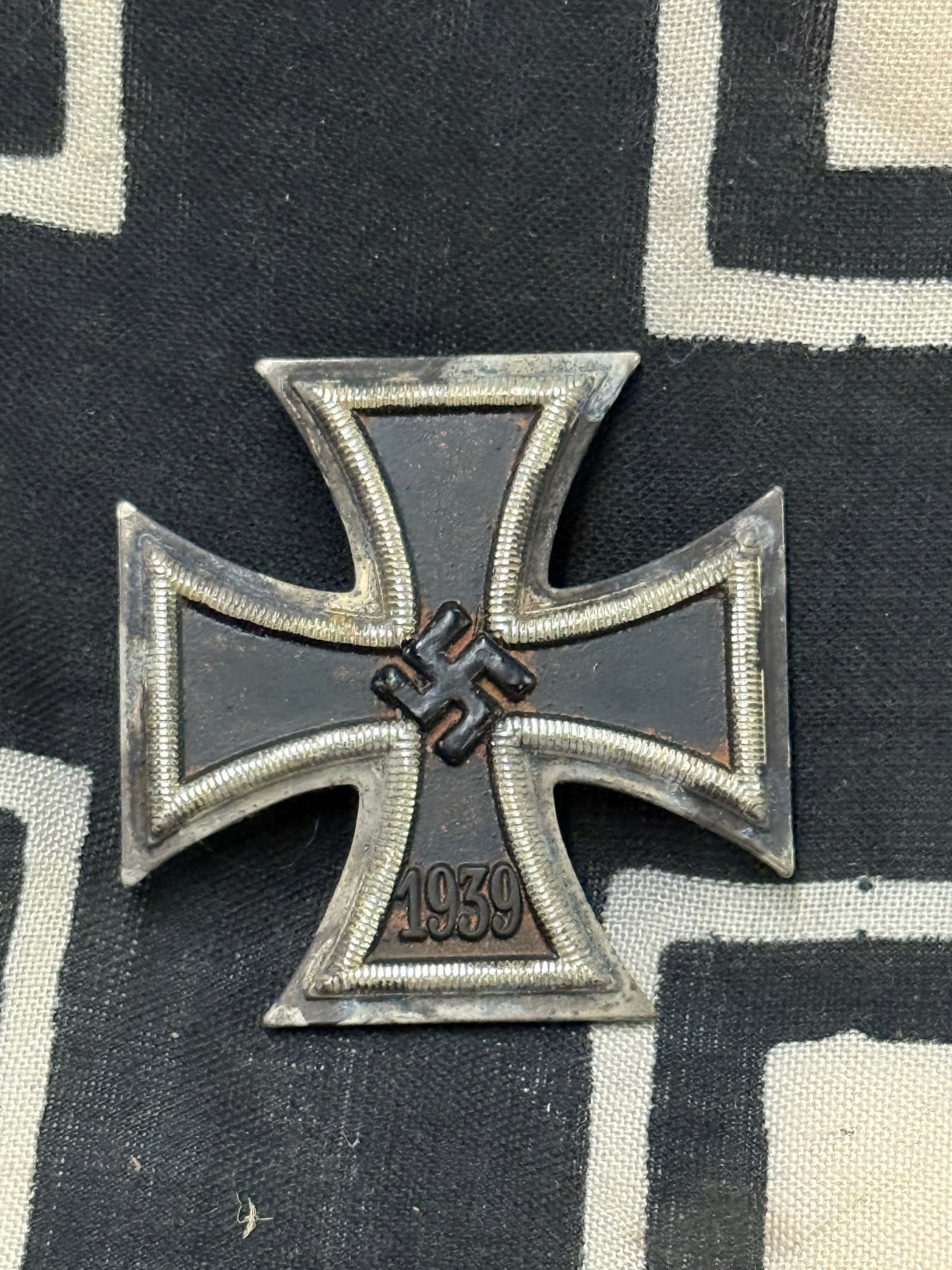 SCARCE WW2 GERMAN 1ST CLASS IRON CROSS MEDAL MARKED 50: SCARCE WW2 GERMAN 1ST CLASS IRON CROSS MEDAL MARKED 50. A VERY RARE EXAMPLE THAT IS IN MINT OVERALL SHAPE AND CONDITION WITH A BEAUTIFUL OVERALL PATINA. SHOWS GOOD WEAR AND USE. PLEASE VIEW ALL DETAIL