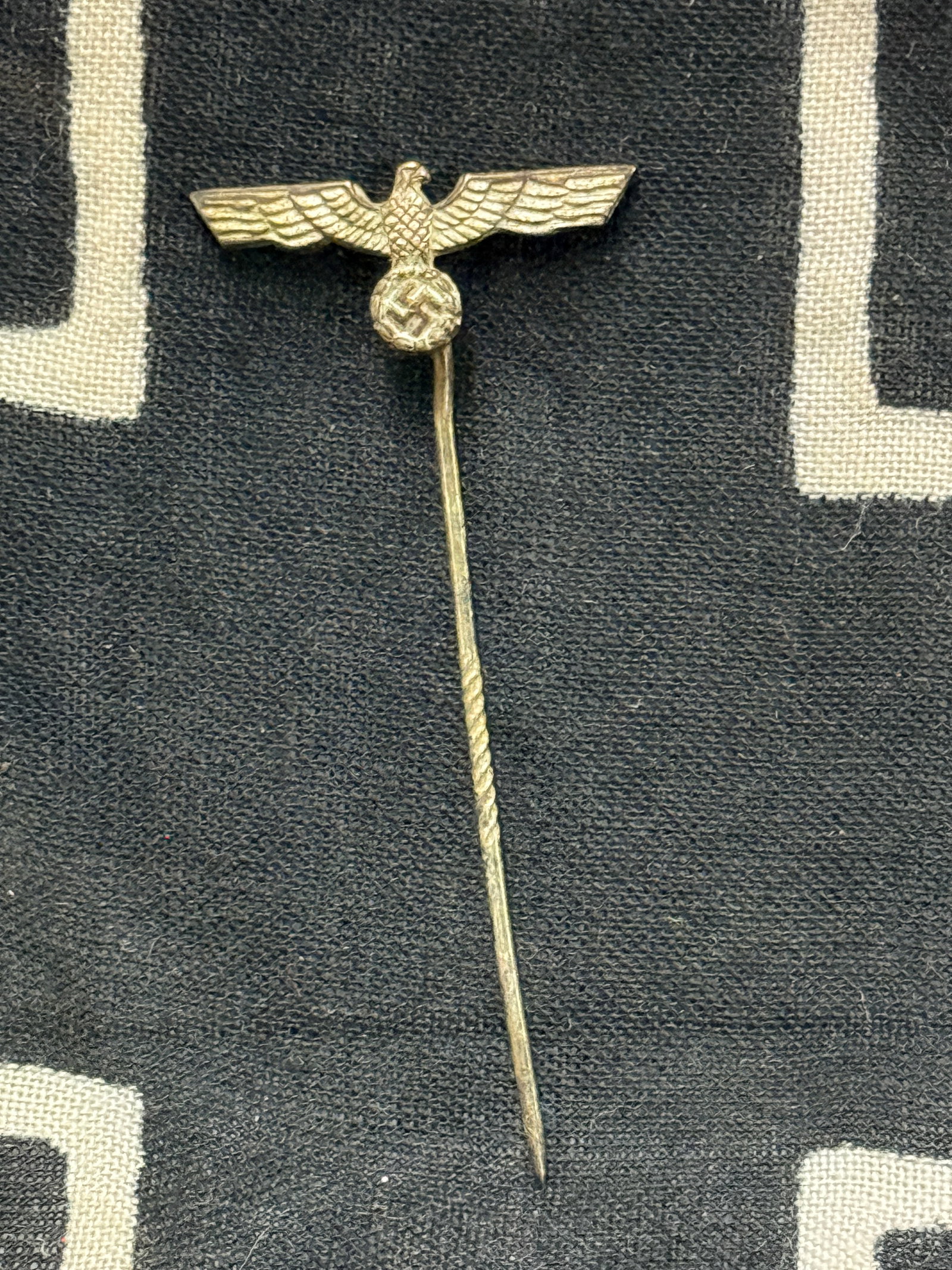 WW2 Kriegsmarine “Donald Duck?? Cap Eagle Stickpin: WW2 Kriegsmarine “Donald Duck” Cap Eagle Stickpin. A rare example. Shows good wear and use with a beautiful overall patina. Please view all detailed pictures. A rare example.