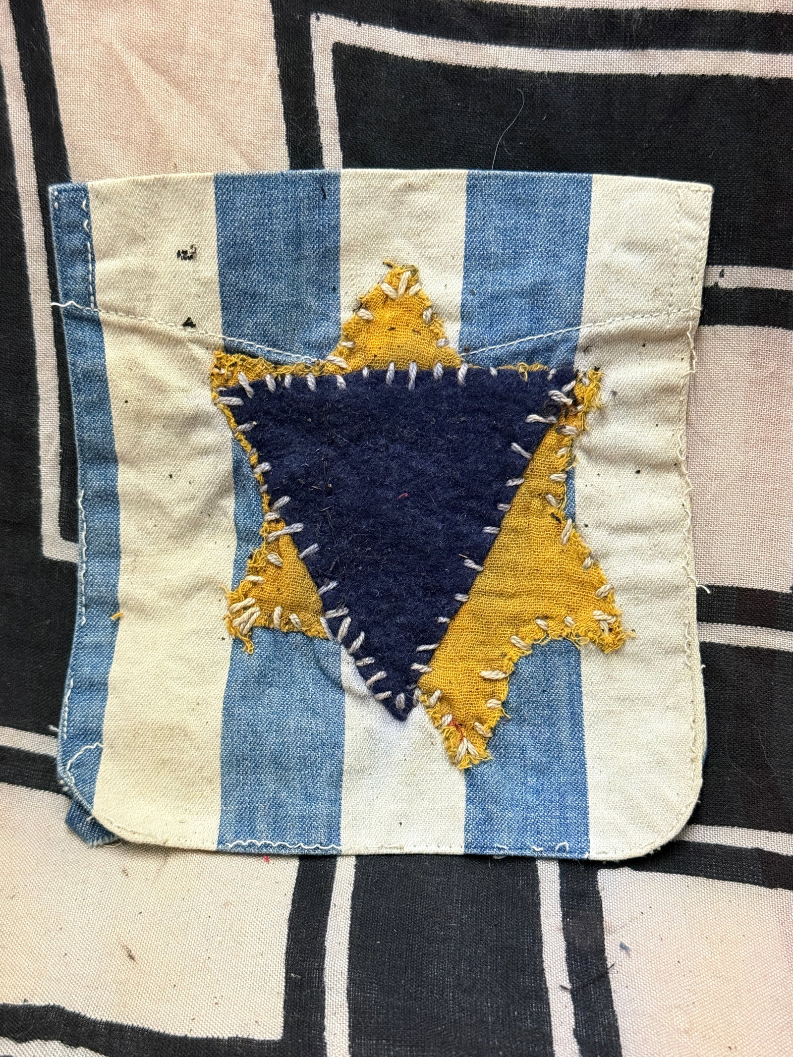 WW2 GERMAN CONCENTRATION CAMP UNIFORM CUT OFF WITH STAR OF DAVID: WW2 GERMAN CONCENTRATION CAMP UNIFORM CUT OFF WITH STAR OF DAVID. AN ULTRA RARE FIND THAT IS IN MINT OVERALL SHAPE AND CONDITION WITH A BEAUTIFUL OVERALL PATINA. SHOWS GOOD WEAR AND USE. PLEASE VIEW A