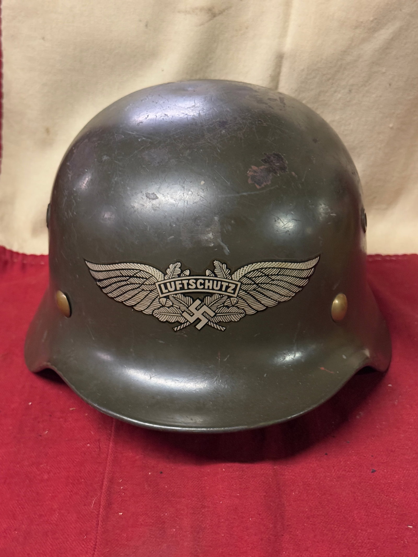 German WWII Early M34 Civic Square Dip Luftschutz Air Defense Steel Helmet: German WWII Early M34 Civic Square Dip Luftschutz Air Defense Steel Helmet. This is a very nice genuine steel construction M34 Civic "Square Dip" Third Reich helmet, outfitted for German WWII Luftschu
