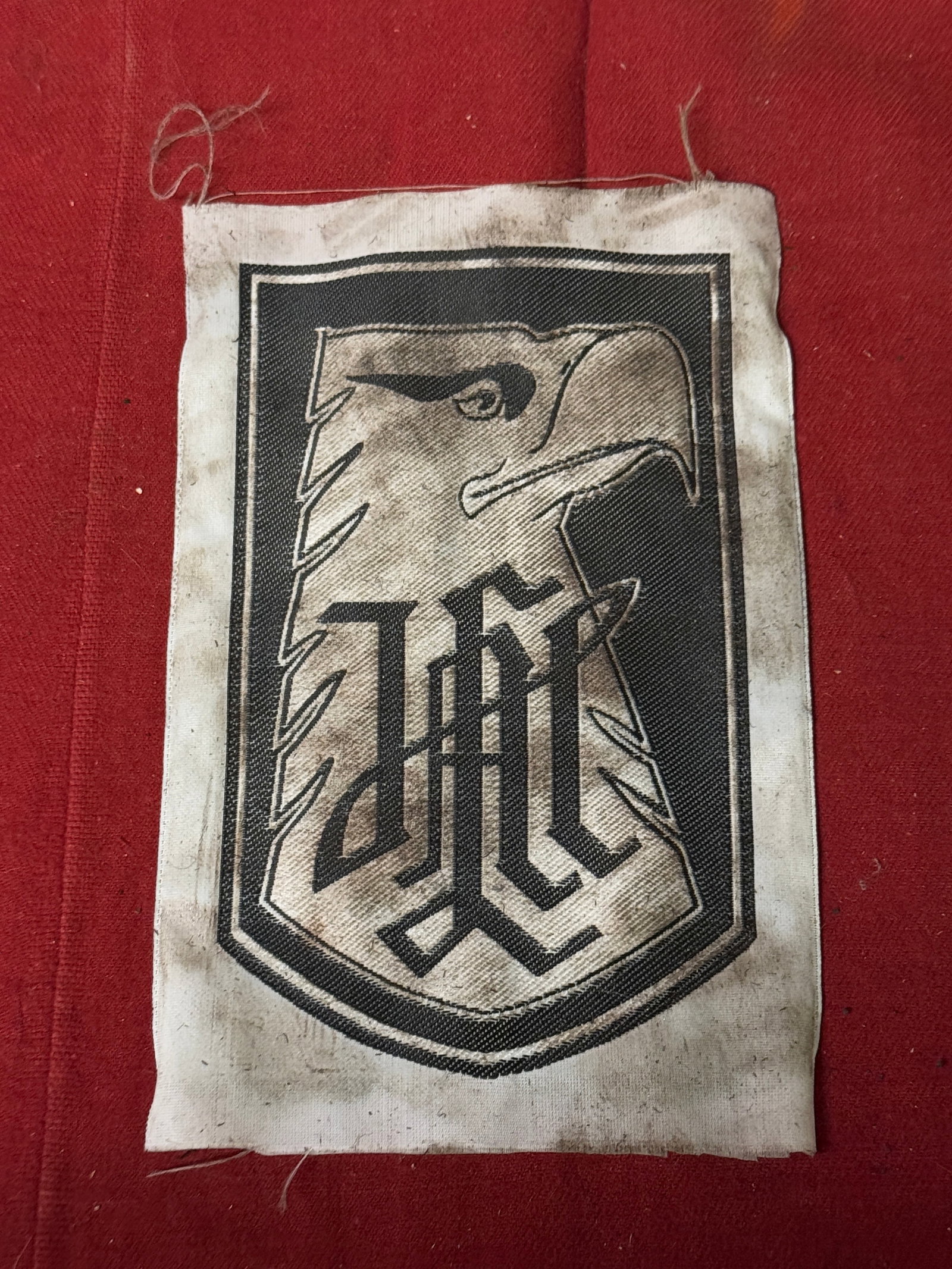 RARE WW2 GERMAN "L.A.H." LEIBSTANDARTE ADOLF HITLER SLEEVE CLOTH BADGE INSIGNIA: RARE WW2 GERMAN "L.A.H." LEIBSTANDARTE ADOLF HITLER SLEEVE CLOTH BADGE INSIGNIA. A VERY RARE EXAMPLE THAT IS IN MINT OVERALL SHAPE AND CONDITION WITH A BEAUTIFUL OVERALL PATINA. SHOWS GOOD WEAR. LOOKS