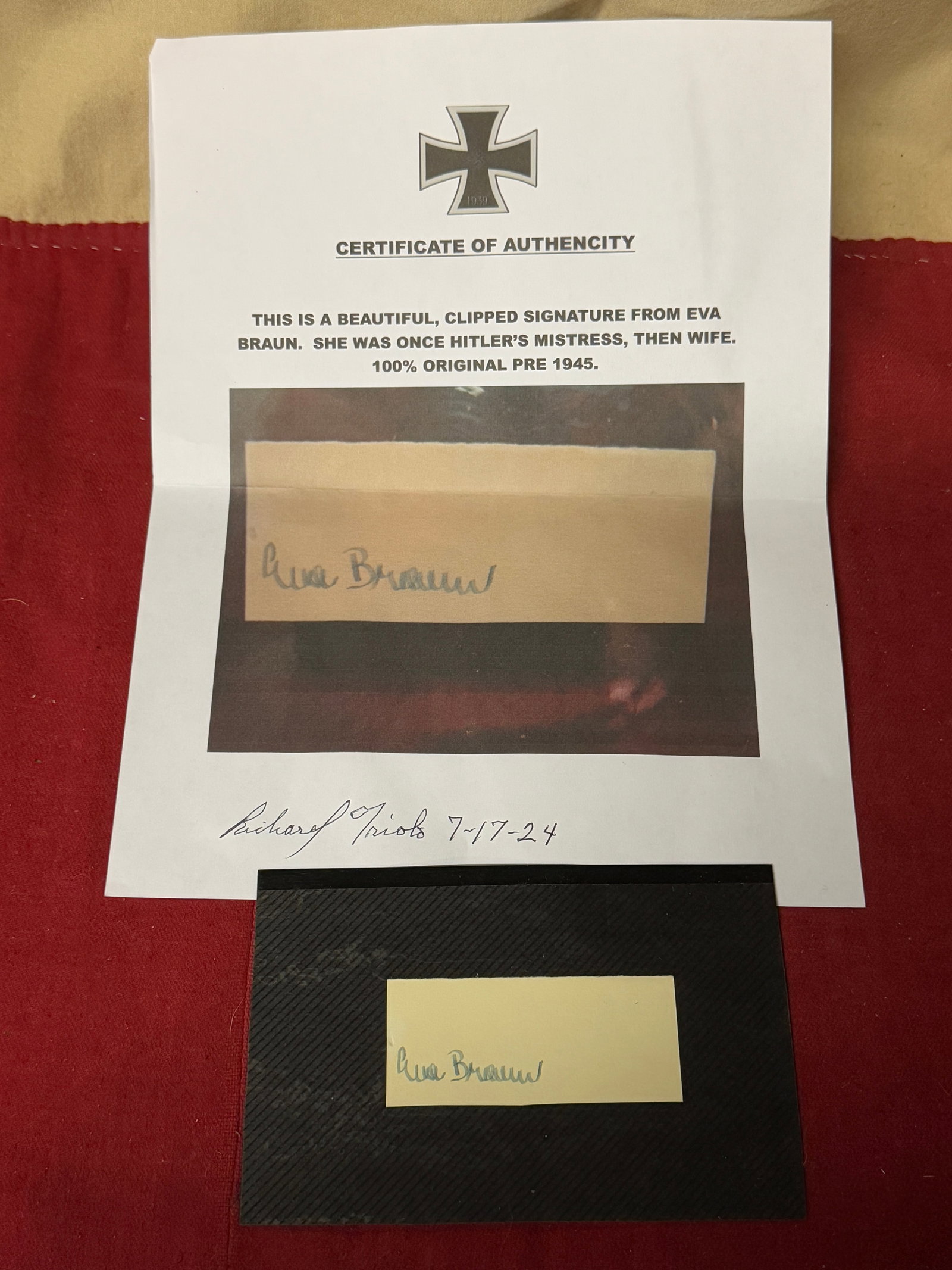 WW2 GERMAN HAND-SIGNED CLIPPED SIGNATURE OF EVA BRAUN "HITLER'S MISTRESS" WITH COA: WW2 GERMAN HAND-SIGNED CLIPPED SIGNATURE OF EVA BRAUN "HITLER'S MISTRESS". A VERY RARE FIND. EVA BRAUN WAS HITLER'S MISTRESS, THEN WIFE. PRE 1945 AND 100% ORIGINAL. COMES WITH THE PICTURED COA. A VERY