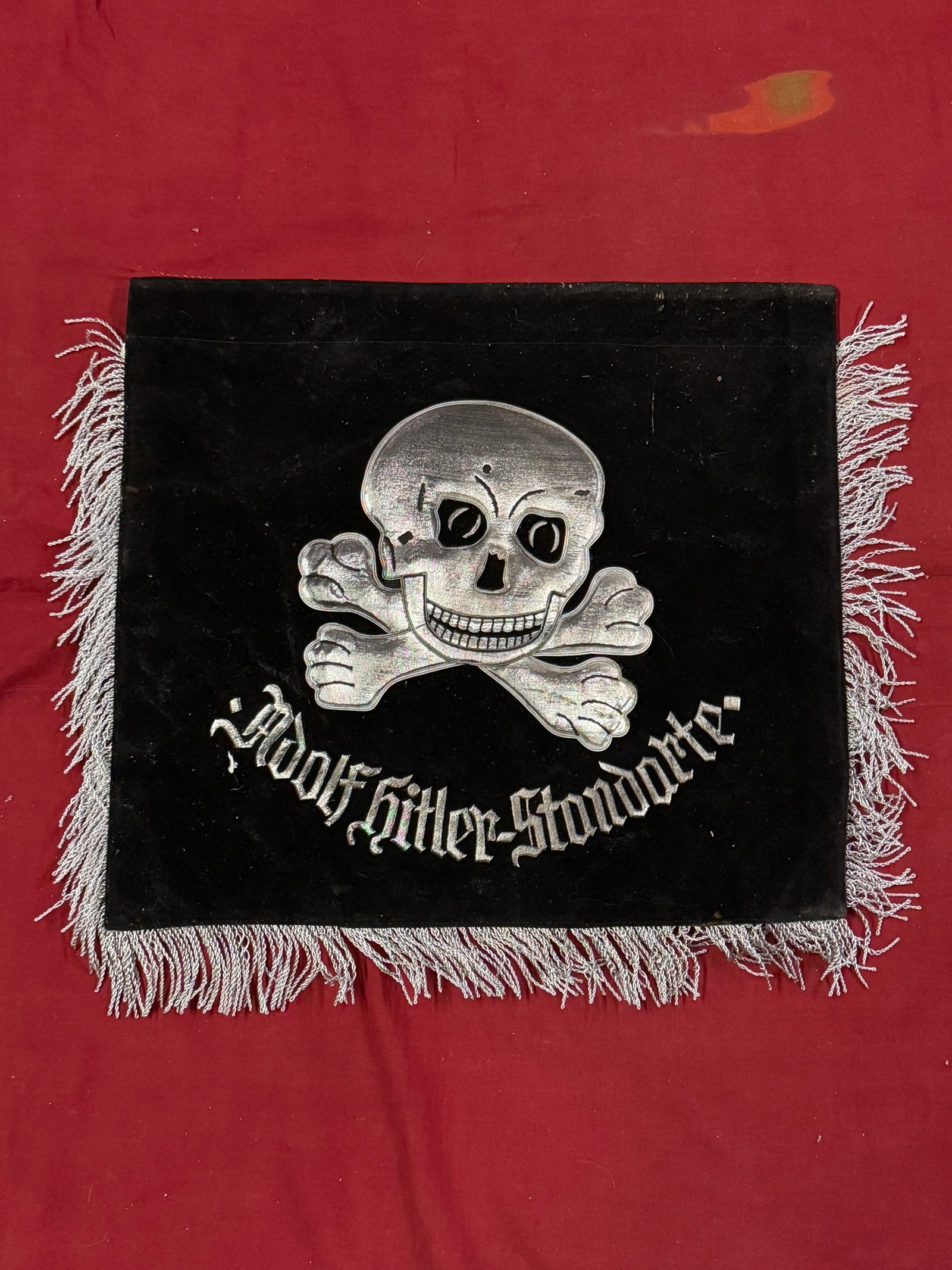 WWII GERMAN REICH SS HITLER STANDARTE BANNER FLAG: WWII German Reich Adolf Hitler Standarte Totenkopf SS banner flag in very good condition. Threading underneath Totenkopf and SS bullion design. Fringes on three sides in very good condition. Flag meas
