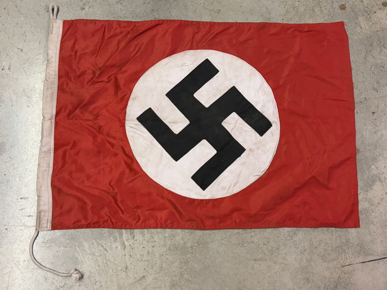 SCARCE WW2 GERMAN NSDAP STATE FLAG: SCARCE WW2 GERMAN NSDAP STATE FLAG. A RARE EXAMPLE. SHOWS GOOD WEAR AND USE WITH A BEAUTIFUL OVERALL PATINA. PLEASE VIEW ALL DETAILED PICTURES. A RARE FIND.