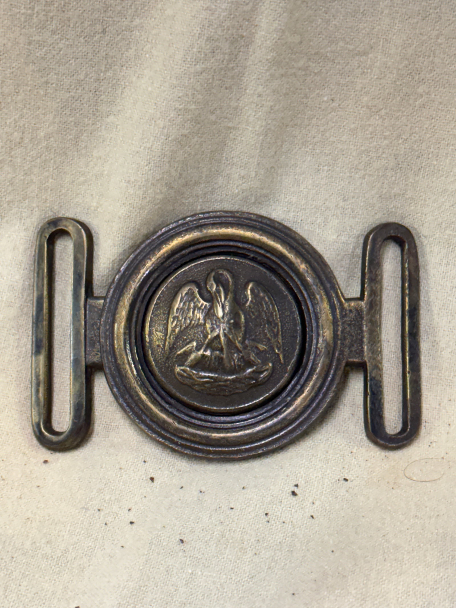 CIVIL WAR CONFEDERATE CSA LOUISIANA PELICAN 2-PIECE BELT PLATE BUCKLE: CIVIL WAR CONFEDERATE CSA LOUISIANA PELICAN 2-PIECE BELT PLATE BUCKLE. A VERY RARE FIND THAT IS IN MINT OVERALL SHAPE AND CONDITION WITH A BEAUTIFUL OVERALL PATINA. SHOWS GOOD WEAR AND USE. PLEASE VIE