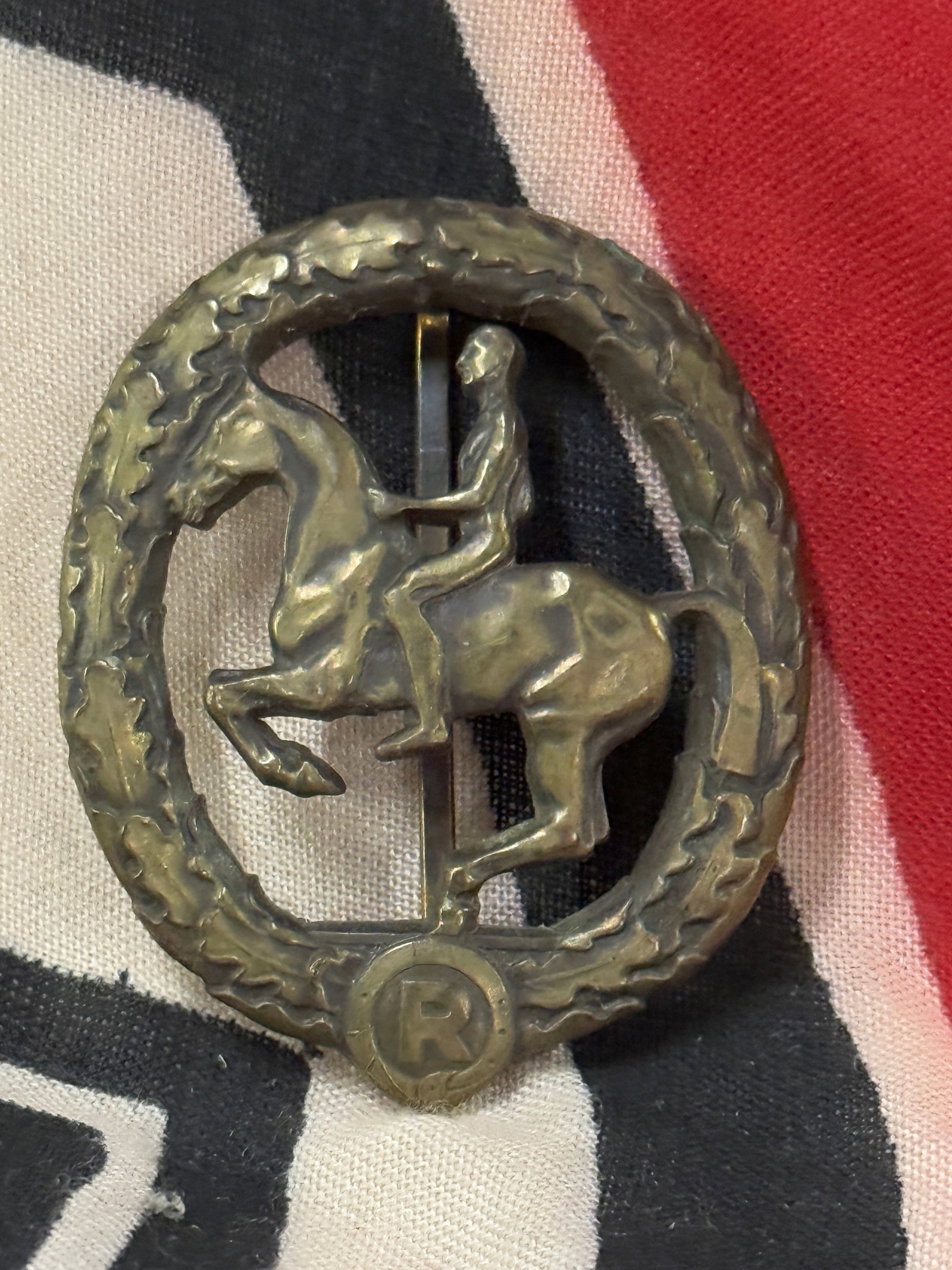 Rare WW2 German Equestrian Badge - Maker Marked: Rare WW2 German Equestrian Badge - Maker Marked. Shows good wear and use with a beautiful overall patina. Please view all detailed pictures. A scarce example.