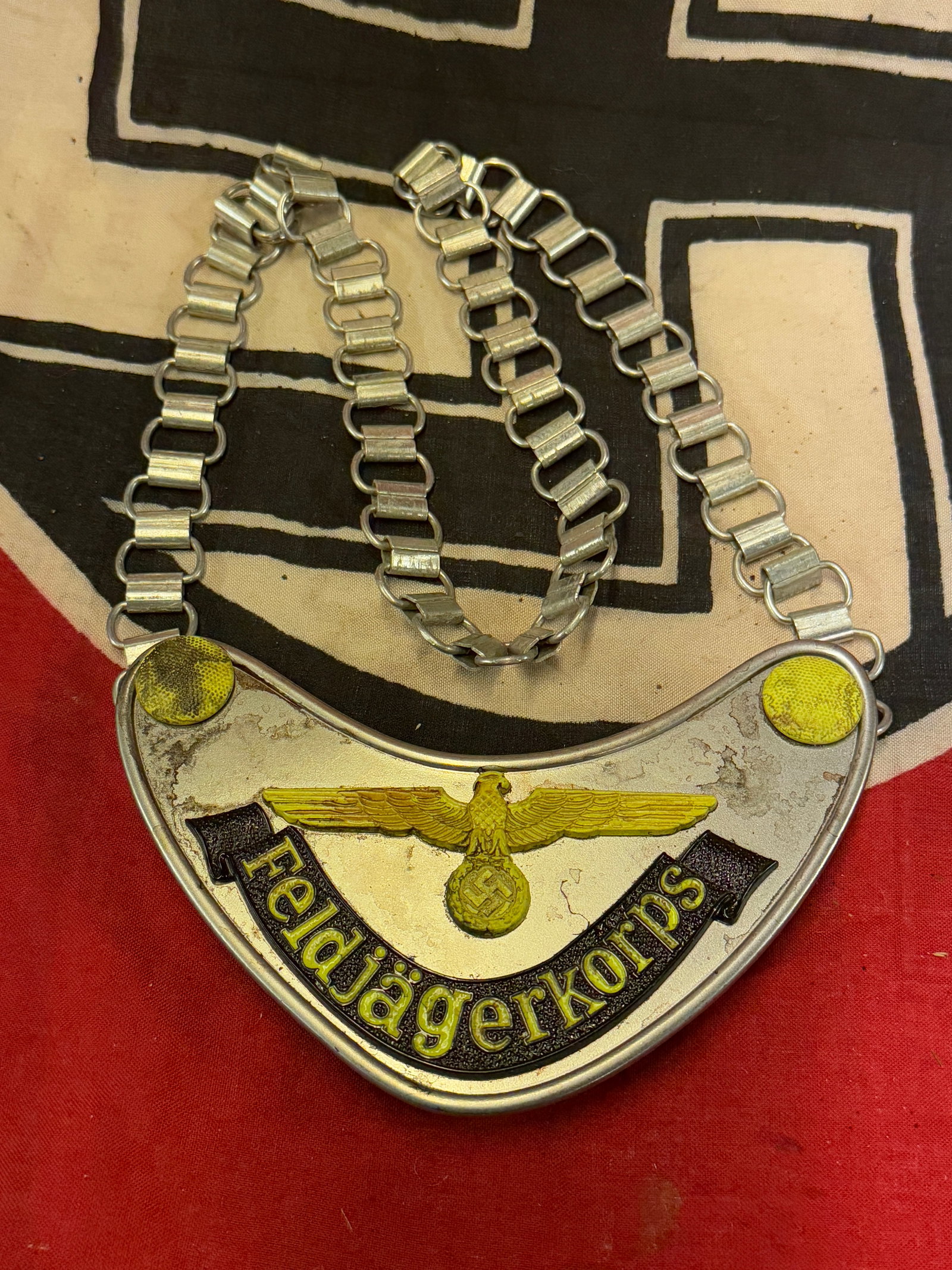 WW2 German Wehrmacht “Feldgendarmerie?? Gorget: WW2 German Wehrmacht “Feldgendarmerie” Gorget. A rare example. Wehrmacht Ringkragen “Feldgendarmerie” (Army Military Field Police). Multi-piece construction, both the gorget and the ch