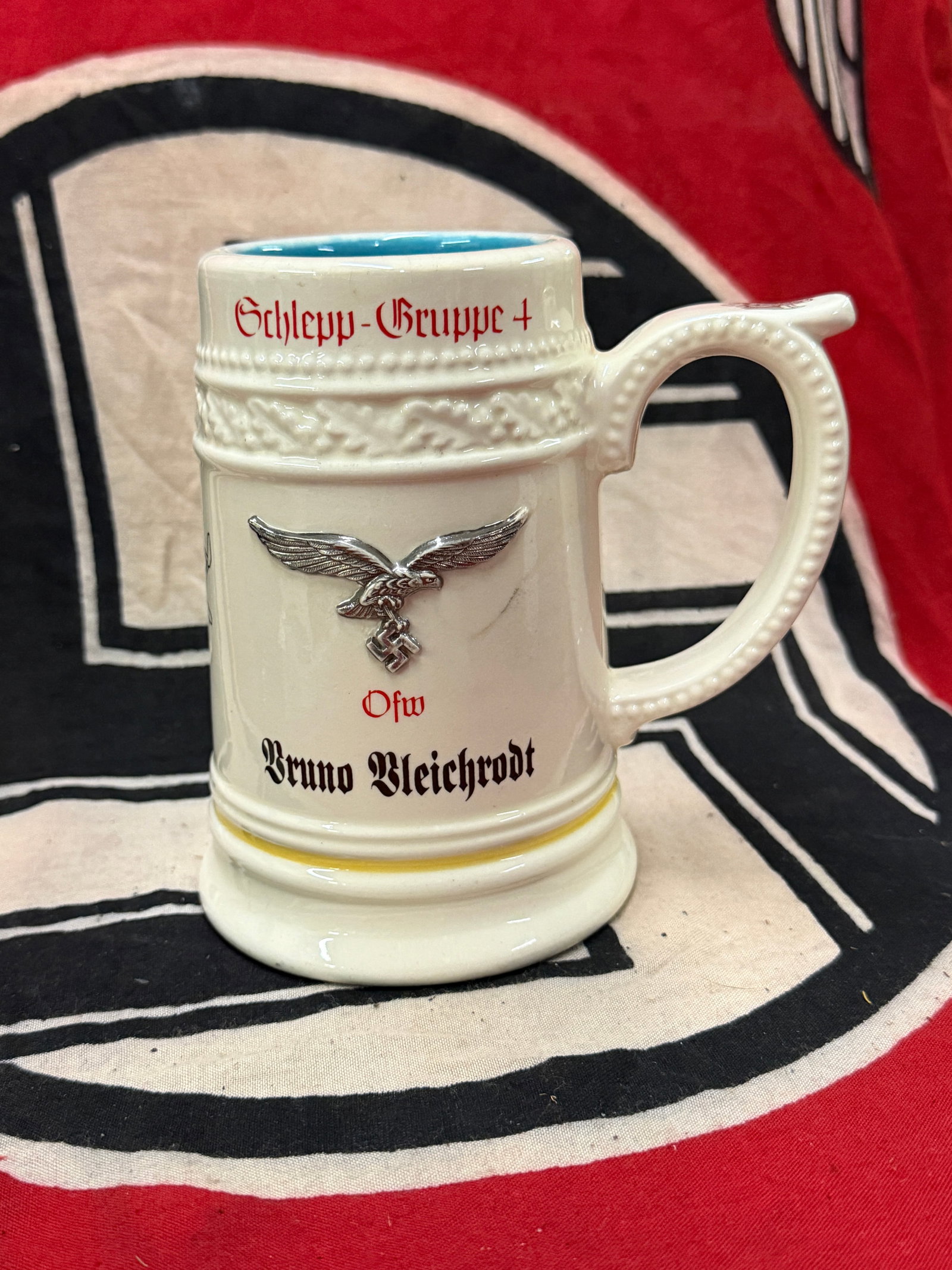RARE WW2 GERAN LUFTWAFFE PILOTS PORCELAIN BEER MUG BY RZM: RARE WW2 GERAN LUFTWAFFE PILOTS PORCELAIN BEER MUG BY RZM - MAKER MARKED ON THE REVERSE WITH VARIOUS MARKINGS. THIS BEER MUG IS IN MINT SHAPE AND CONDITION AND IS FREE OF ANY CRACKS, CHIPS, ETC. THIS 