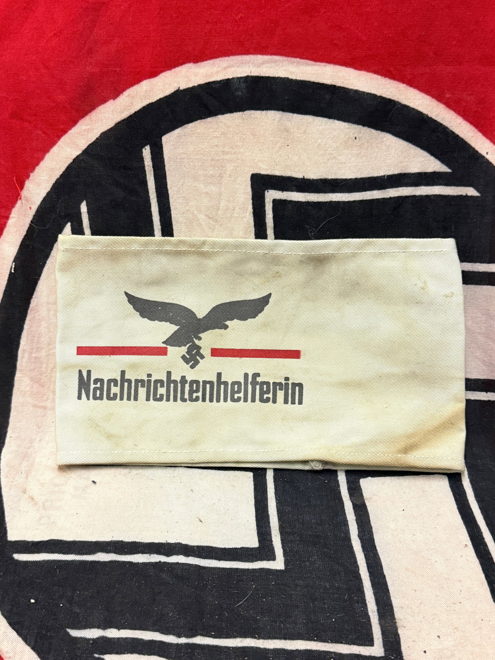 WW2 German Luftwaffe armband female intelligence unit (Nachrichtenhelferin): WW2 German Luftwaffe armband female intelligence unit (Nachrichtenhelferin). Shows good wear and use with a beautiful overall patina. Please view all detailed pictures. A very rare example.