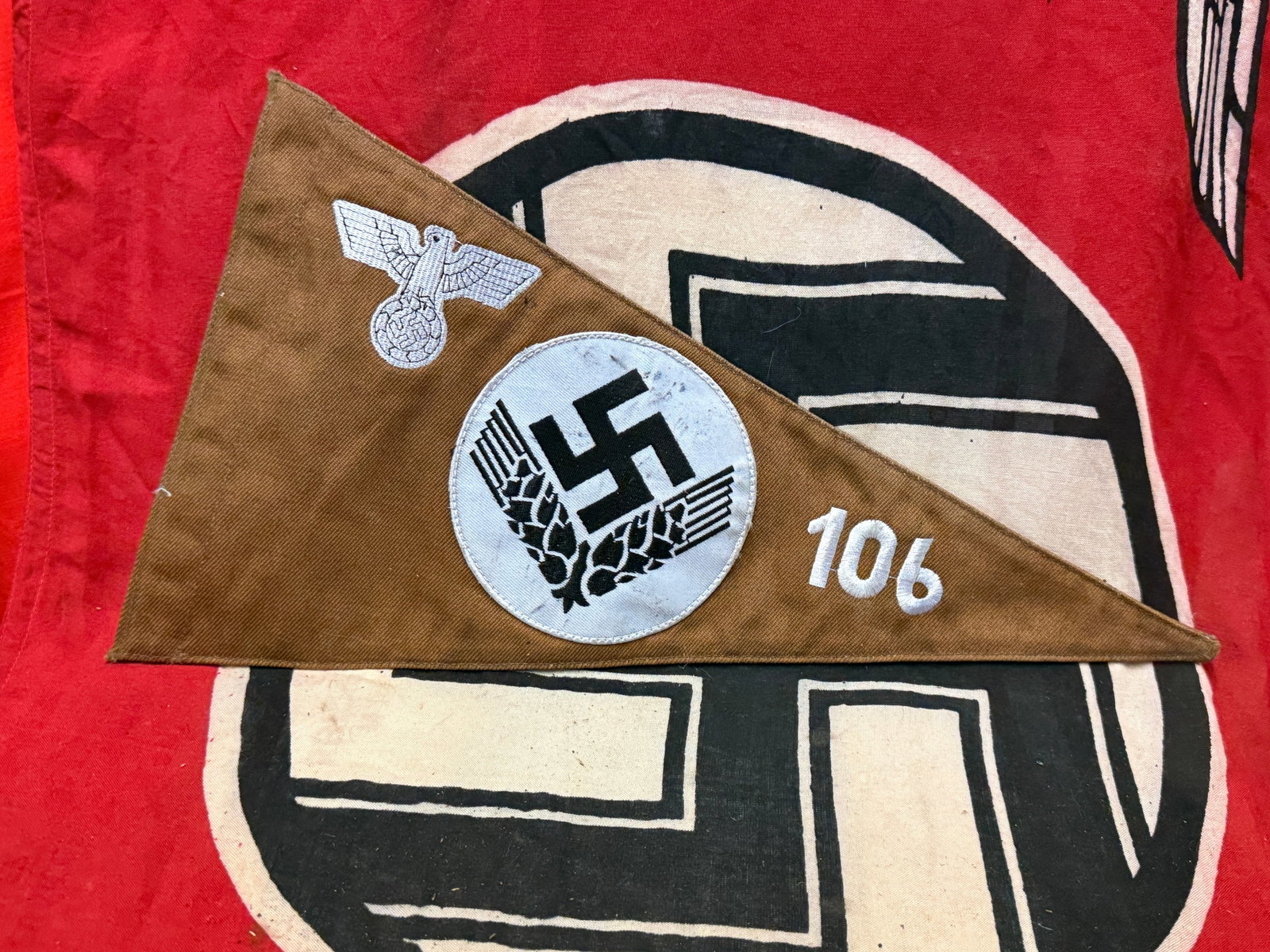 A Rare WW2 German Reichsarbeitsdienst Female Unit 106 (Niederschlesien) Car Pennant: A Rare WW2 German Reichsarbeitsdienst Female Unit 106 (Niederschlesien) Car Pennant. An ultra rare find that is in mint overall shape and condition with a beautiful overall patina. Shows good wear and