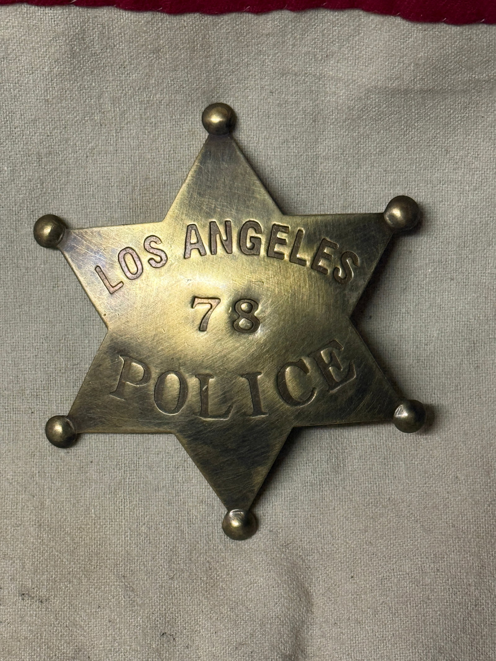 ANTIQUE LOS ANGELES 78 POLICE BADGE: ANTIQUE LOS ANGELES 78 POLICE BADGE. AN ULTRA RARE FIND THAT IS IN MINT OVERALL SHAPE AND CONDITION WITH A BEAUTIFUL OVERALL PATINA. SHOWS GOOD WEAR AND USE. PLEASE VIEW ALL DETAILED PICTURES. A VERY 