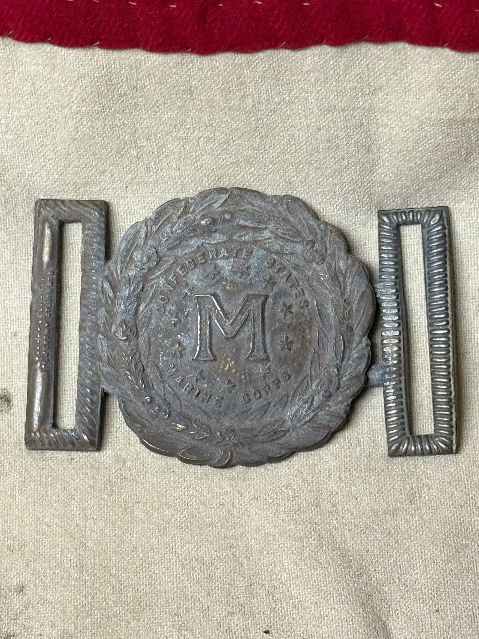 CIVIL WAR CONFEDERATE STATES MARINE CORPS BUCKLE BY ROBINSON ADAMS RICHMOND, VA: CIVIL WAR CONFEDERATE STATES MARINE CORPS BUCKLE BY ROBINSON ADAMS RICHMOND, VA. A VERY RARE FIND THAT IS IN MINT OVERALL SHAPE AND CONDITION WITH A BEAUTIFUL OVERALL PATINA. HAS A GREAT LOOK TO IT WI